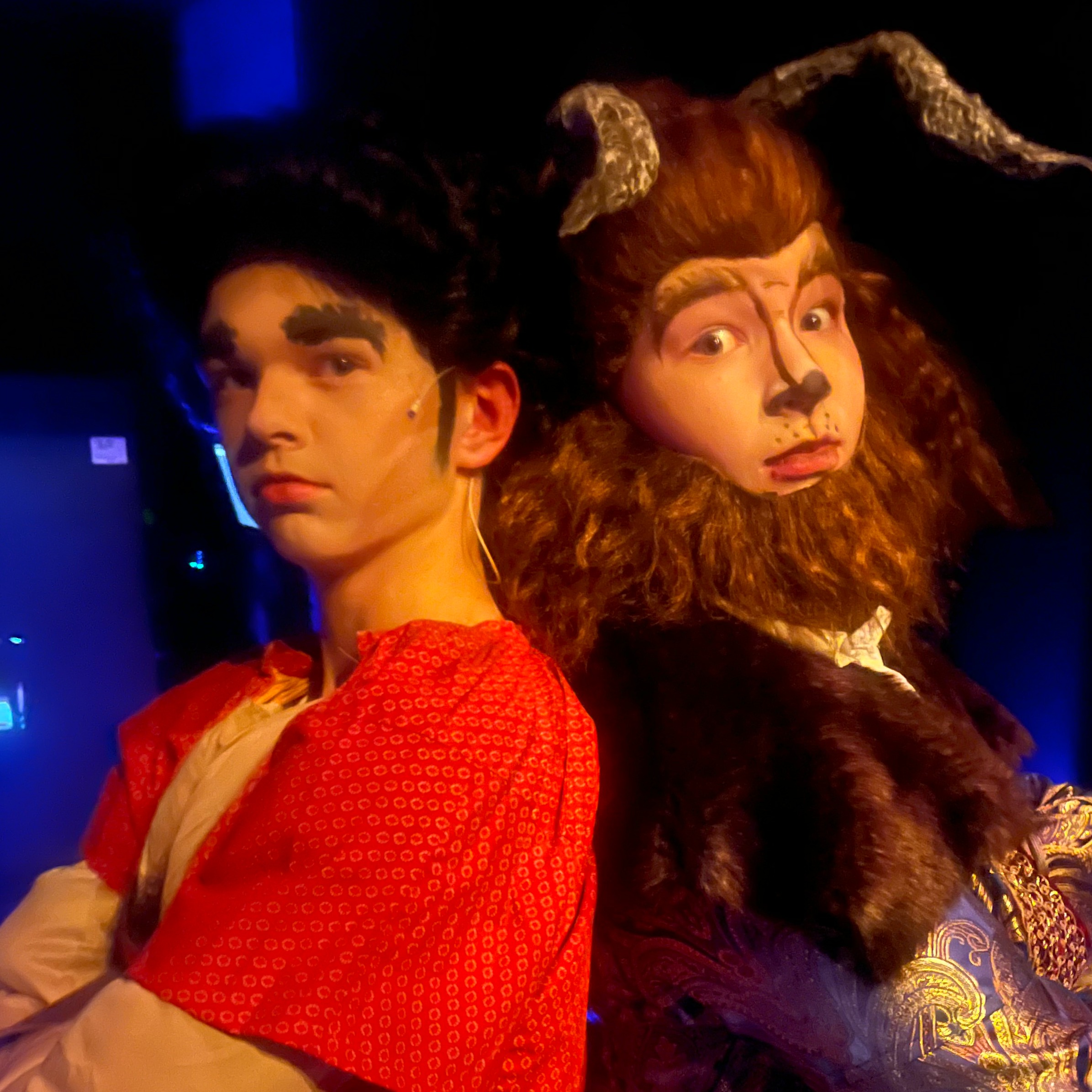 Two students dressed as Gaston and the beast posting back to back from the Junior High Musical, Beauty and the Beast