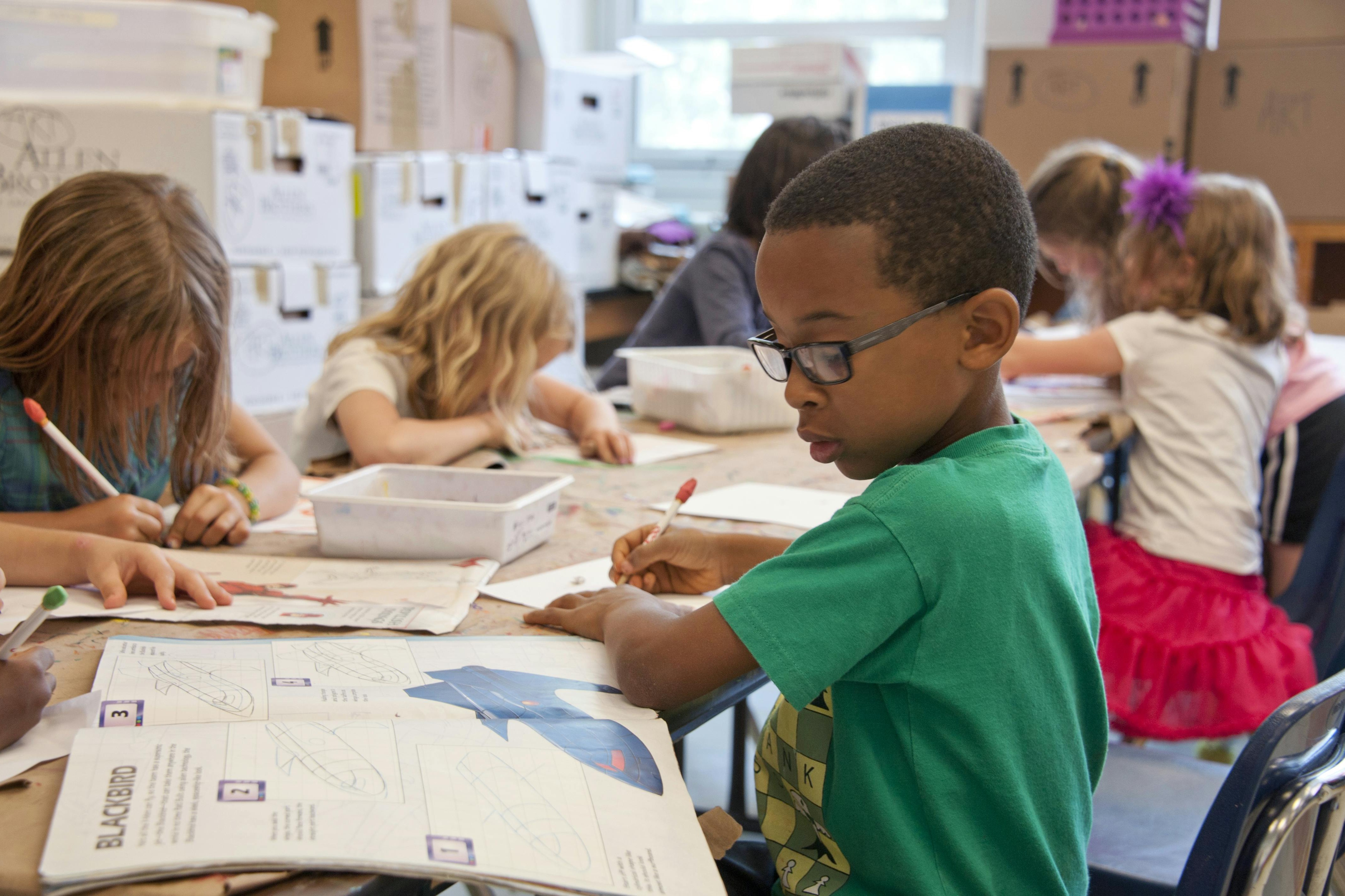 Kids working in class