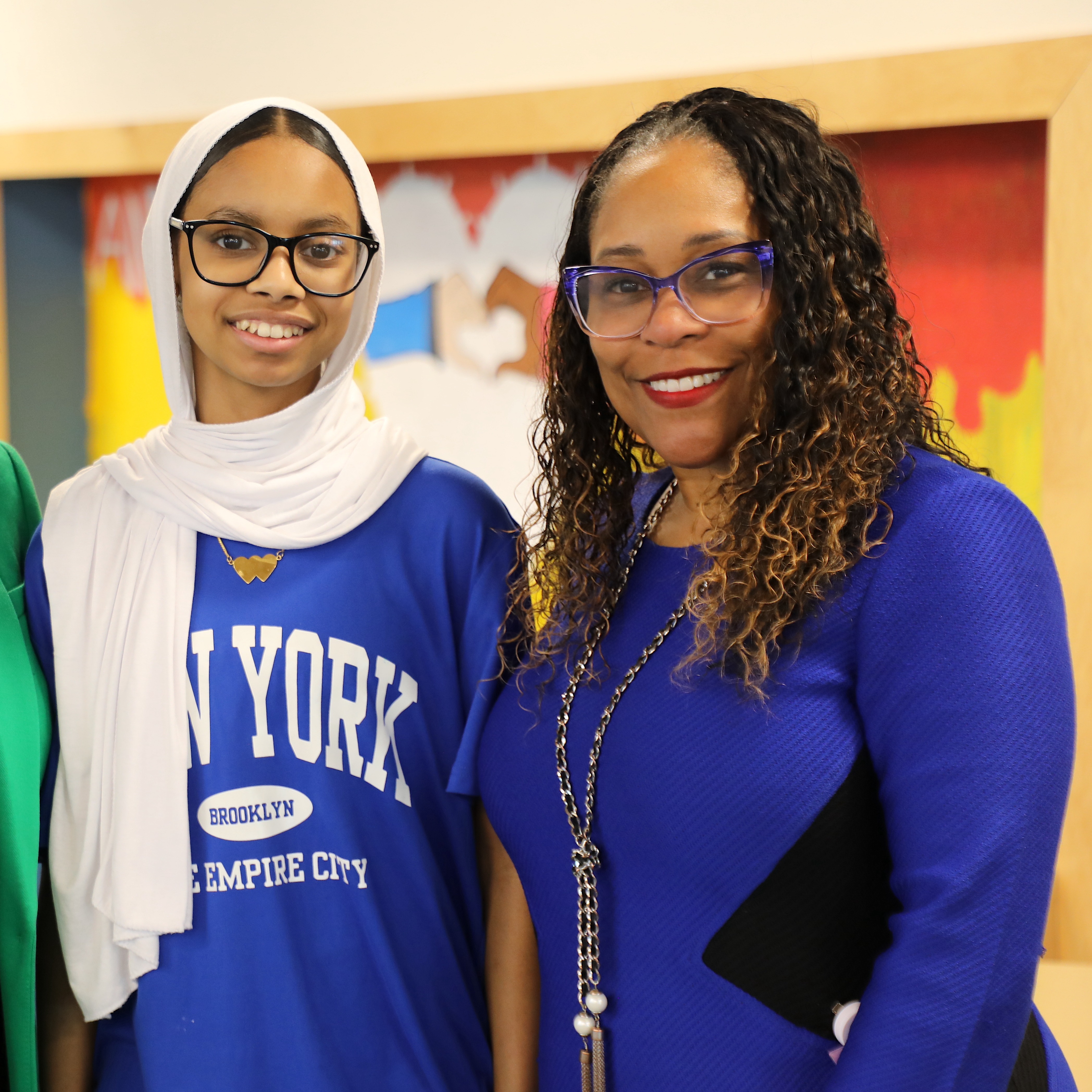 Parent Leadership - Superintendent Dr. Collier stands next to a woman smiling at the camera.
