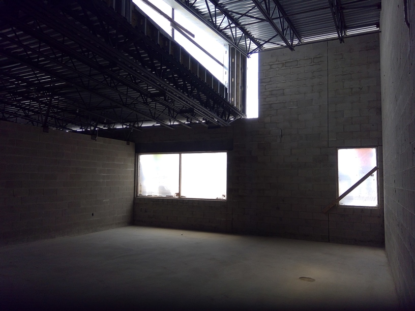 Photo of the Upstairs classroom with natural light from the roofline.