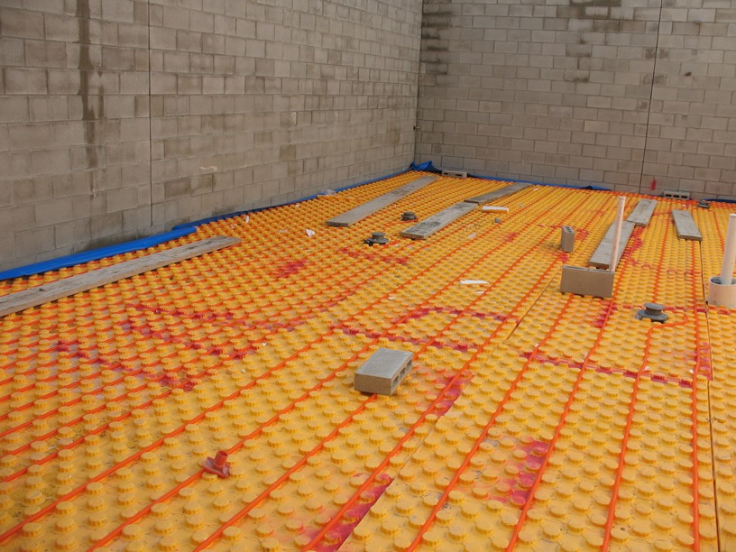 Photo of the Radiant heat flooring in the locker rooms.