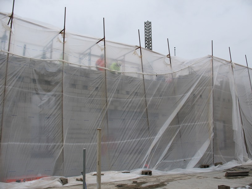 Photo of the Tented scaffolding heated to 65 degrees for construction.