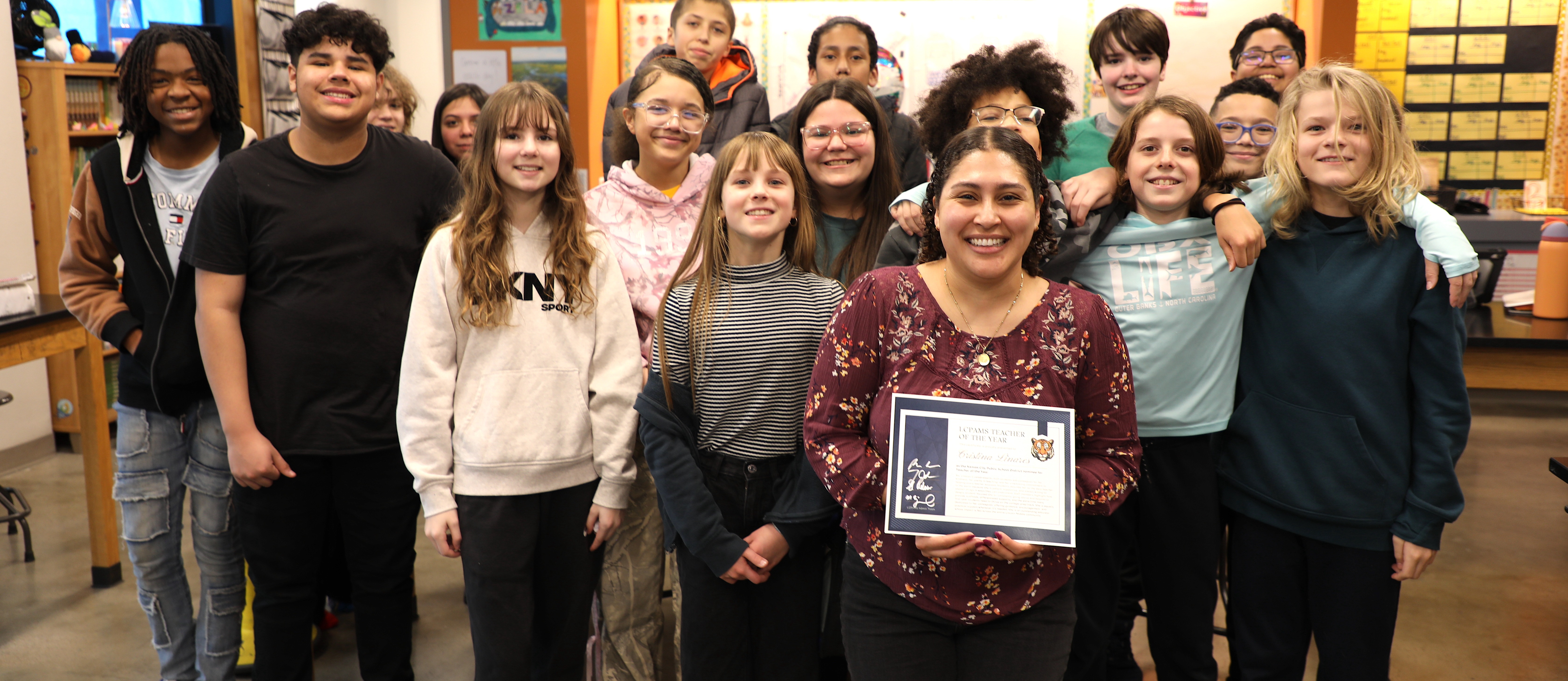 Lincoln Middle student with Teacher of the Year 