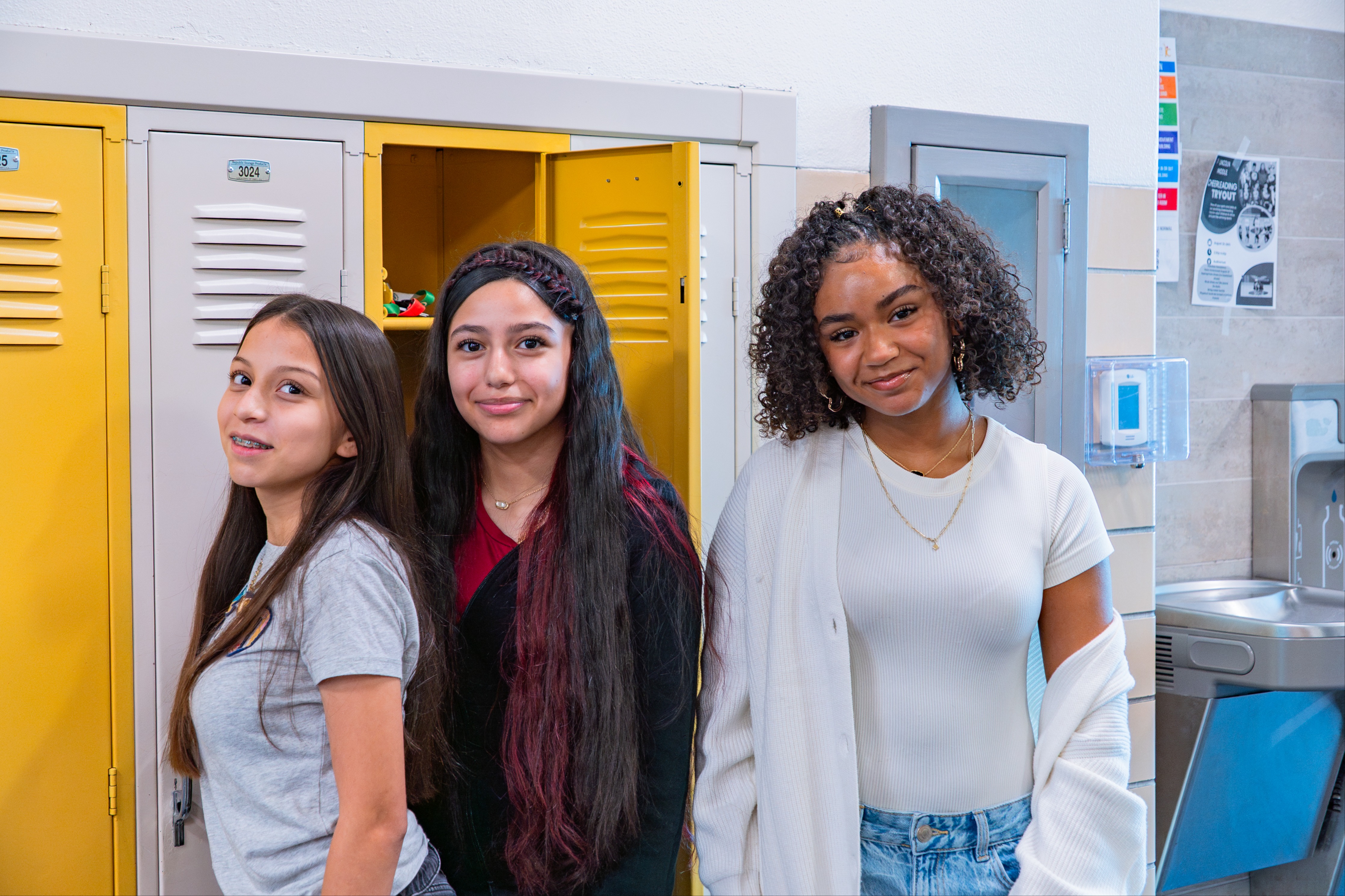 Lincoln Middle School students standing near the lockers
