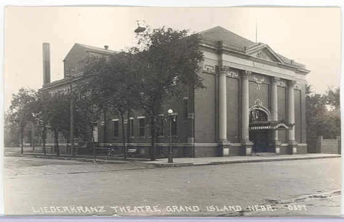  The Liederkranz  401 West First Street  Liederkranz means "a wreath of songs." In 1870, German settlers met to organize a German singing society to provide musical and social entertainment and to cultivate the member's musical talents. The original clubhouse was a two-story frame building erected in 1871. The brick building, constructed in 1911-12, was built for $63,000 by architect Otto Kirschke, a Liederkranz member, and reflects influences of the Neo-Classical Revival style. The hall has long been a community meeting place, an auditorium for civic activities, and a polling place. The Liederkranz is listed on the National Register of Historic Places.