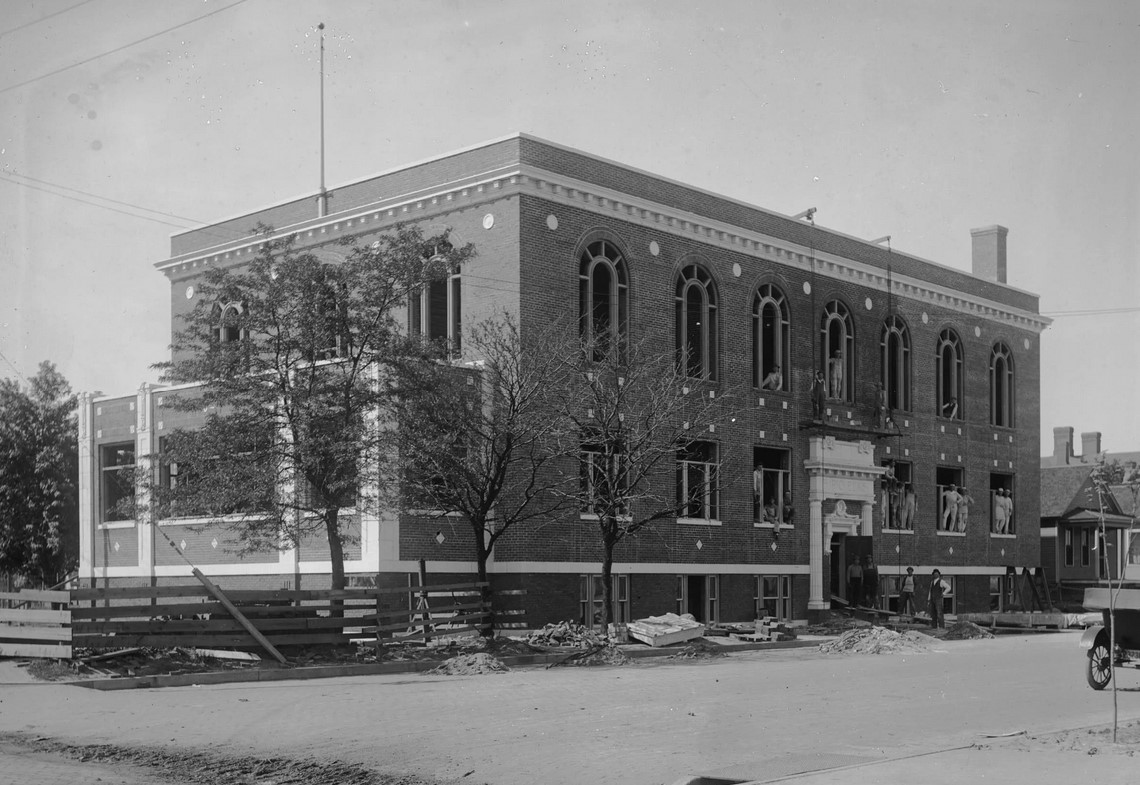  ELKS BUILDING  On July 12, 1900, Grand Island Lodge Number 604 of the Benevolent and Protective Order of Elks was chartered.  Their first meeting was held at the G.A.R. Hall on East Third Street.  In 1916, a building committee was formed to raise money and oversee the construction of a permanent home.  Grand Island photographer Julius Leschinsky took this photograph of the nearly completed Elk’s Building located at the corner of First and Locust Streets in July 1917.  When the lodge opened in 1918 they had a membership in excess of 500.