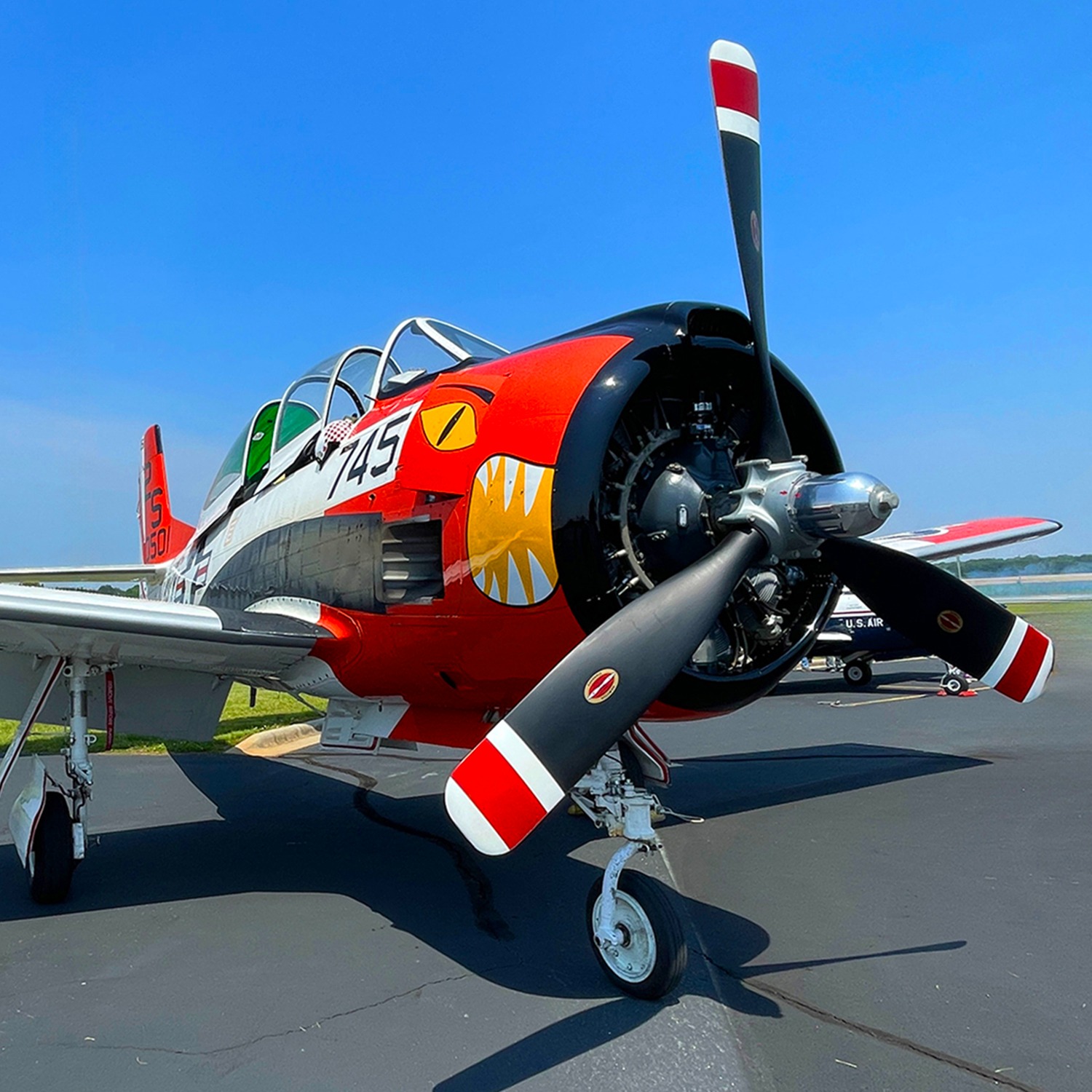 World War II airplane sitting on then tarmac at the Shelby airport