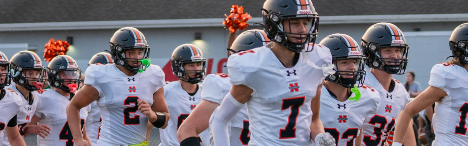 Football Team running out on the field