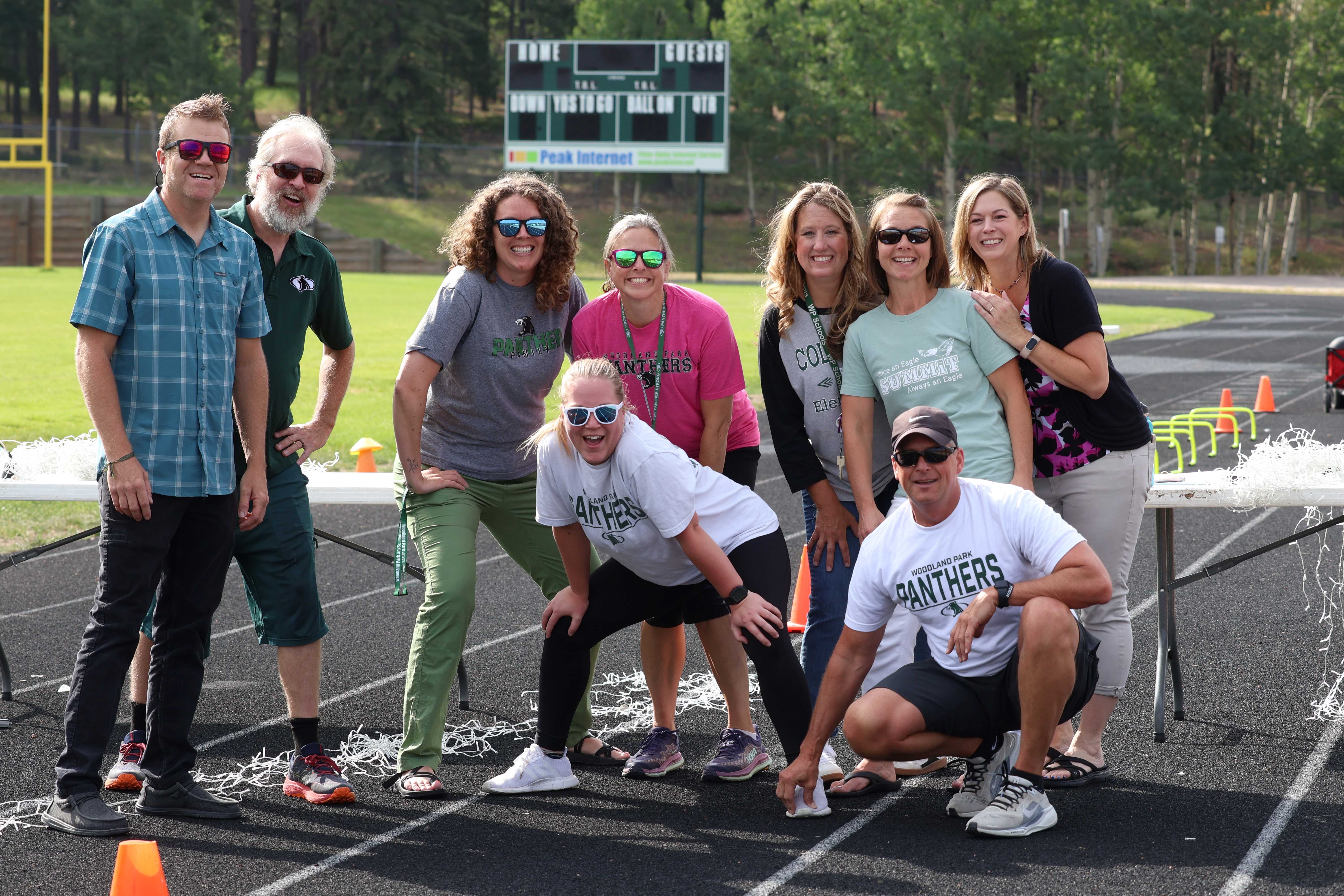 Teachers and staff posing for a picture together