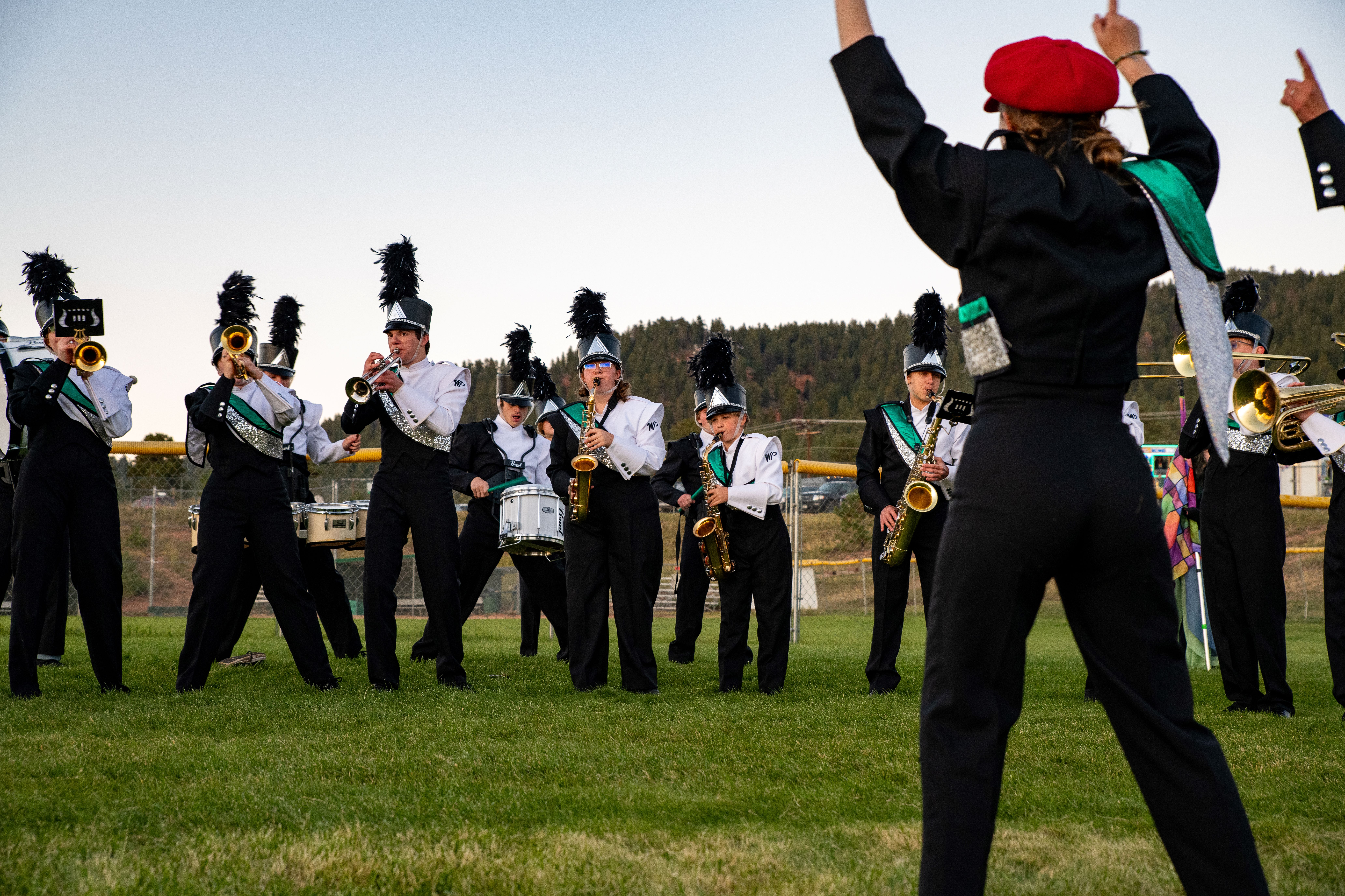 Marching band performing at a rally