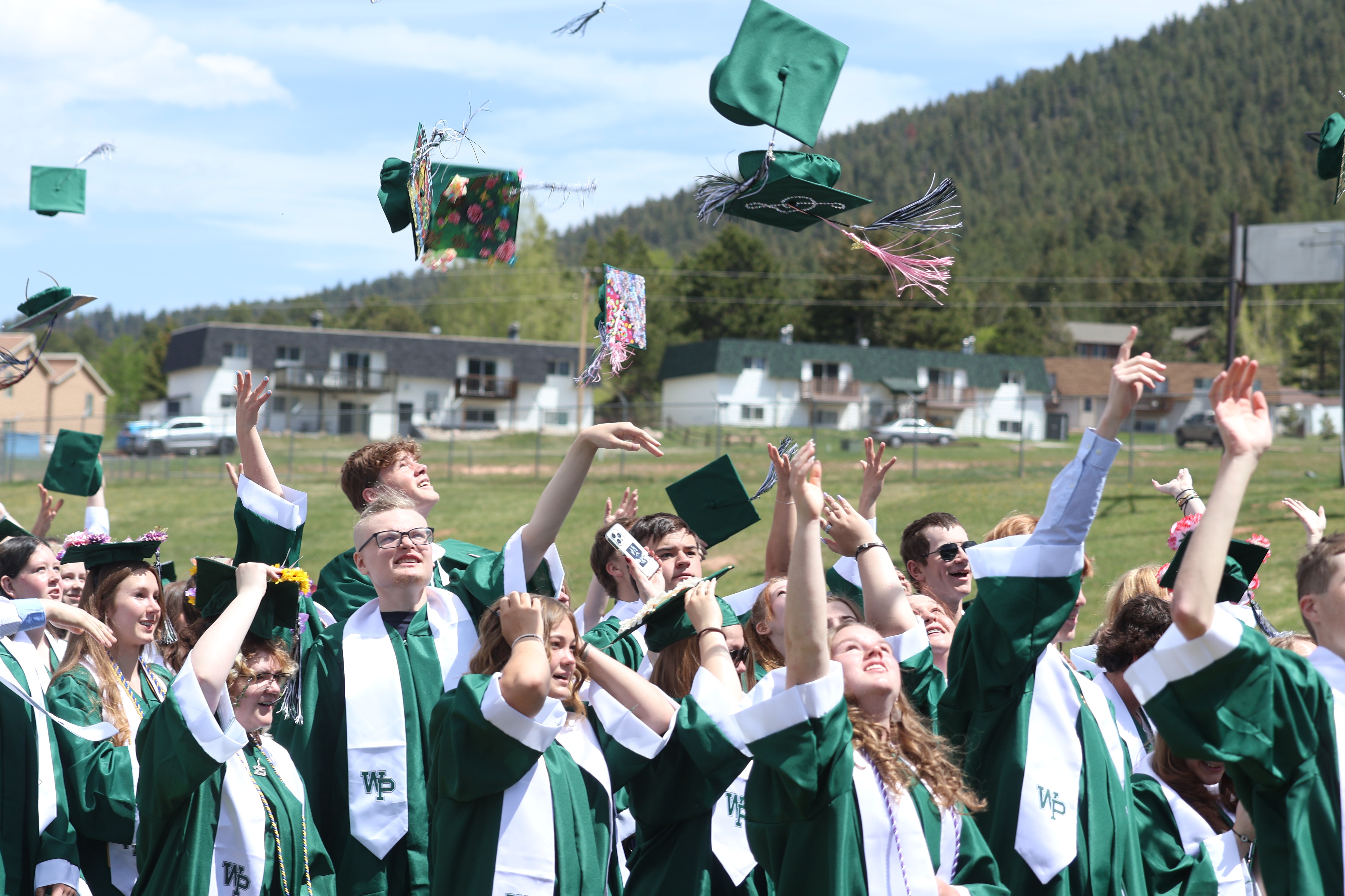 Class of 2025 tossing their graduation caps
