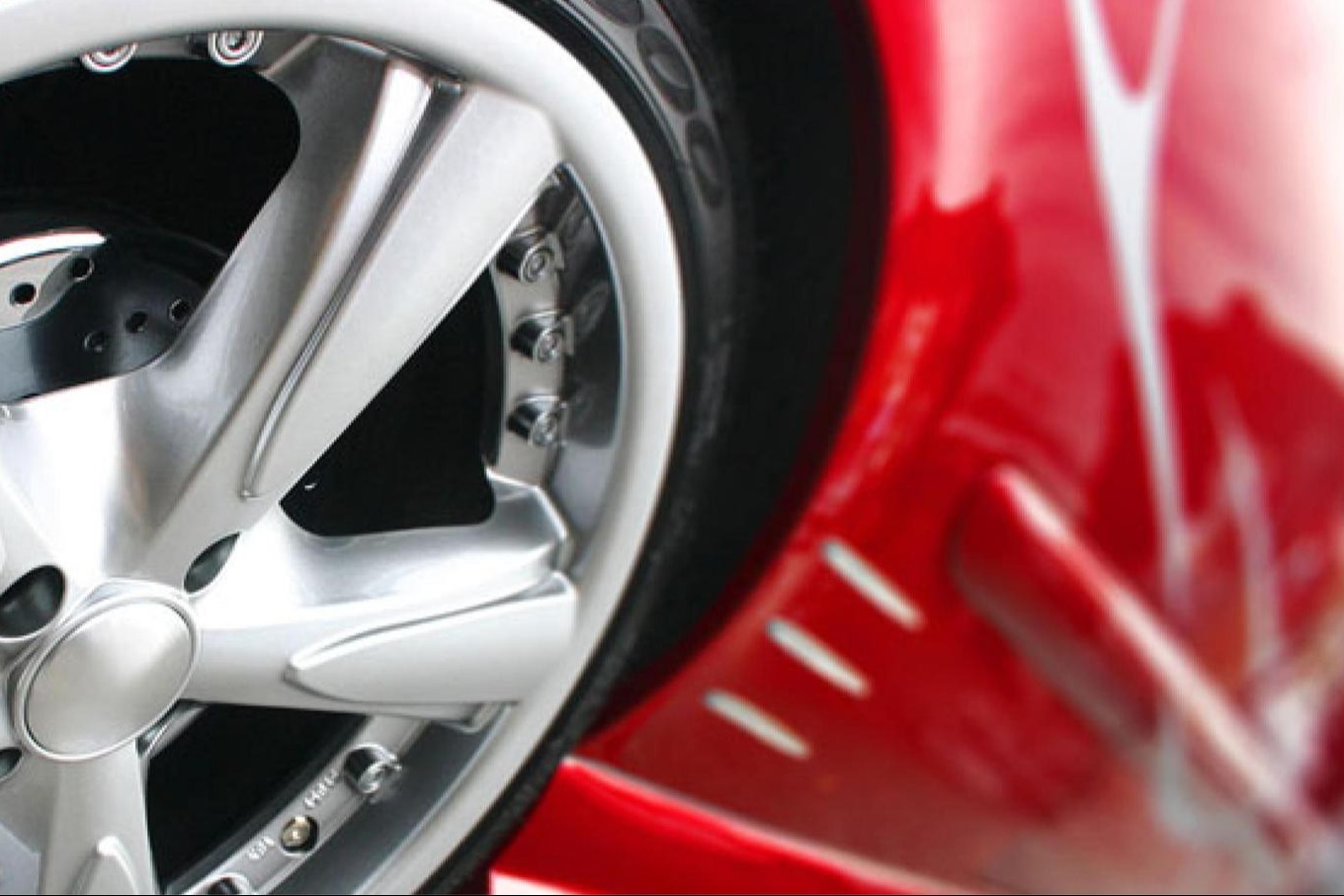 up close red car wheel