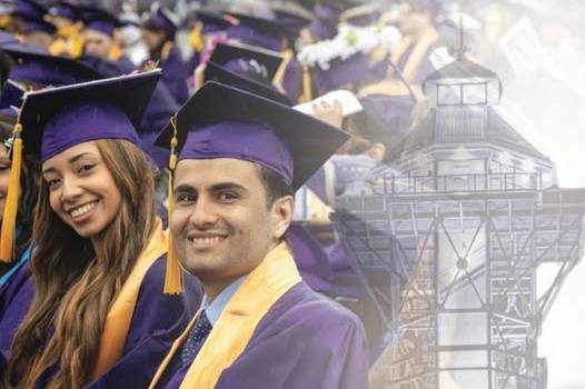 Two students smiling on graduation day which is the cover of the Strategic Plan for Erie's Public Schools. 