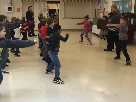 Students learning about martial arts. Mr. Smith encourages our students to be good citizens of the community through integrity, honesty and respect.