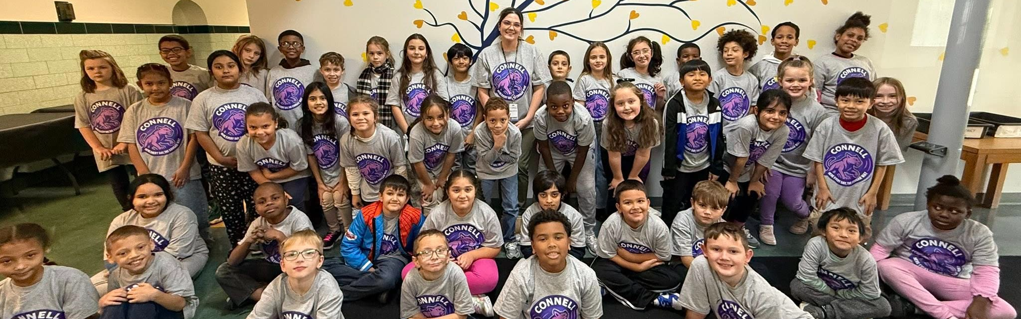 A group of students smiling.