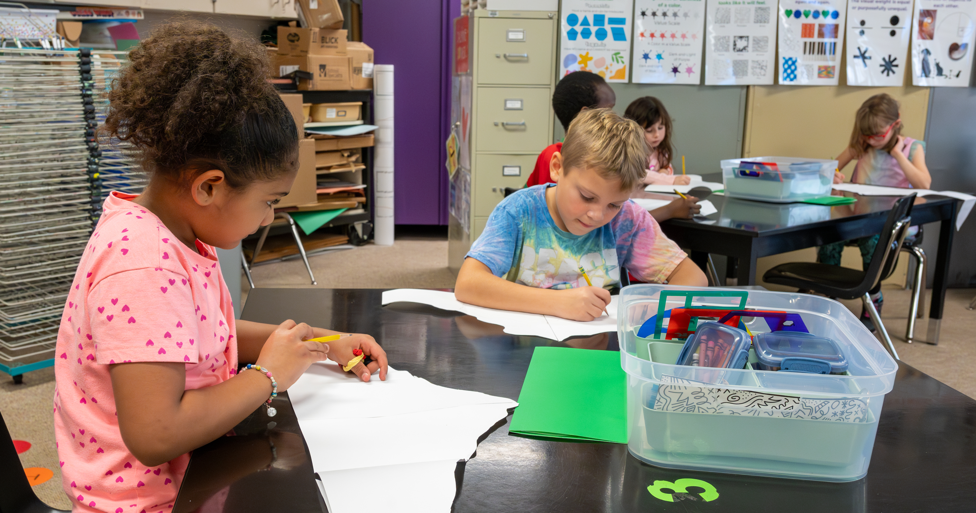 Kids working in class