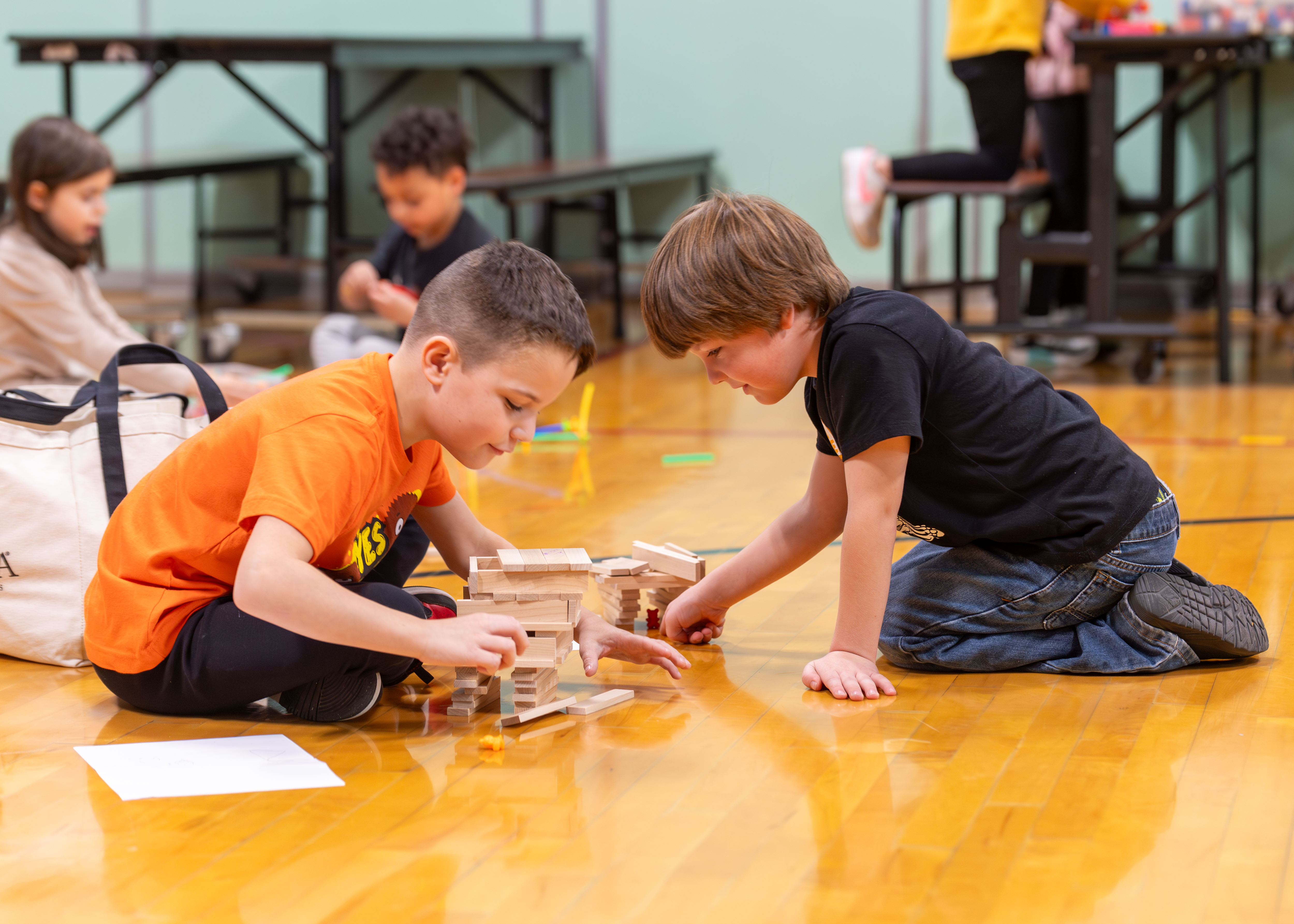 Boys playing with building blocks