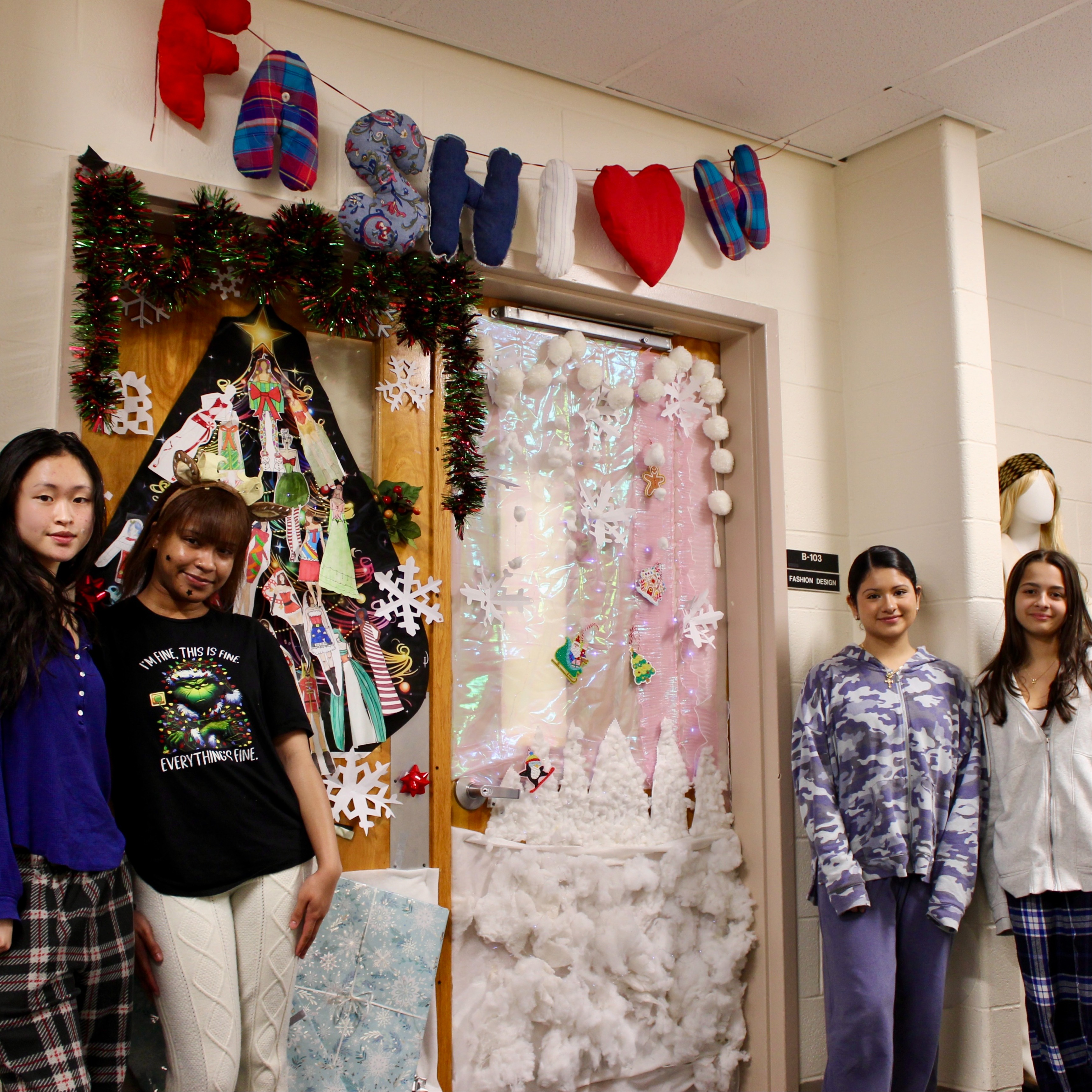 fashion students show off their work outside classroom