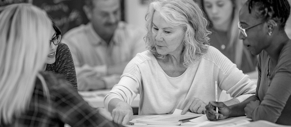 teacher working at a professional learning session.