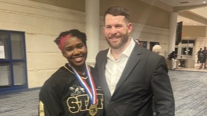 Camille Harris won STATE honors in wrestling. 