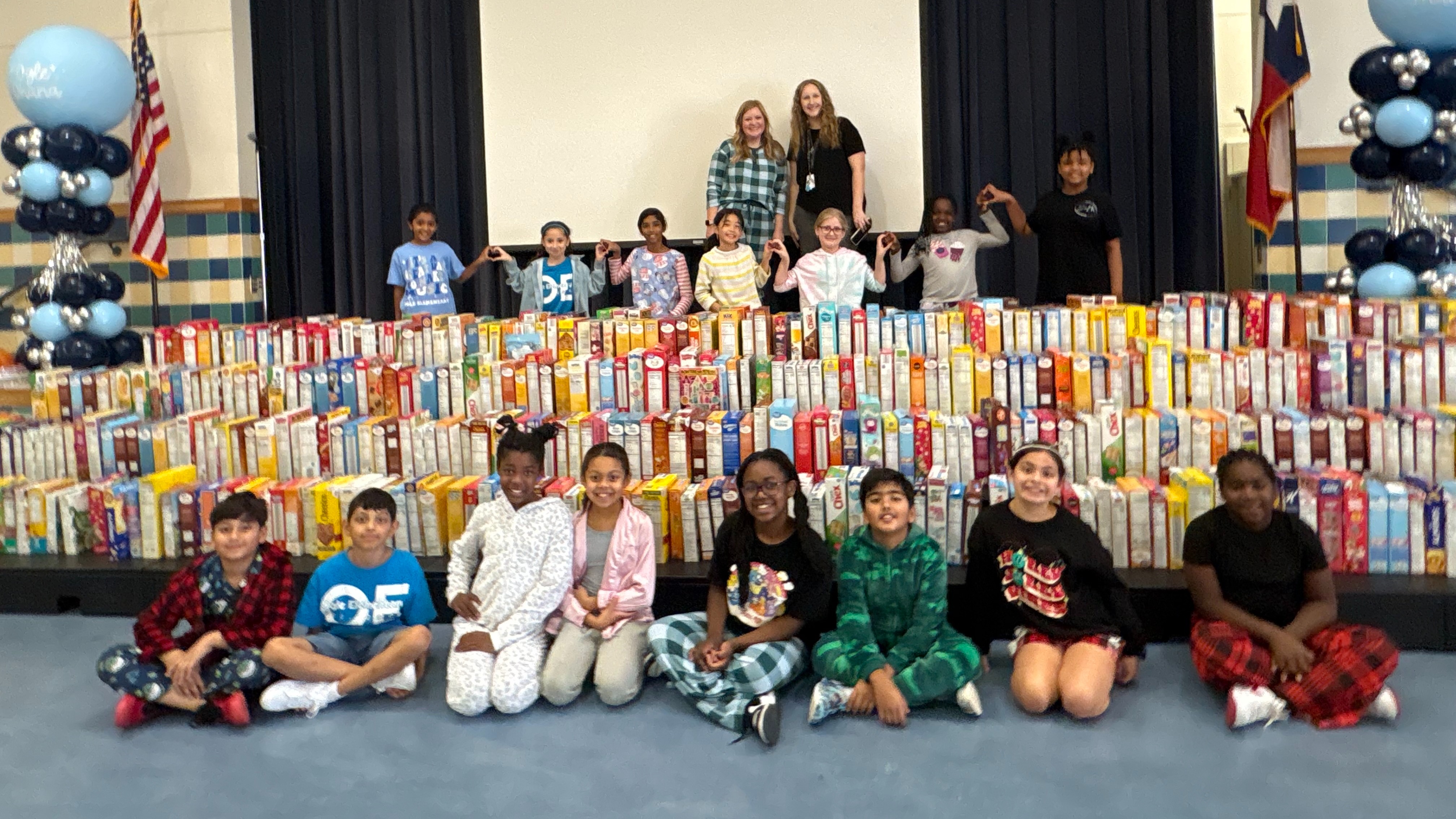 Spirit squad helps with the cereal drive
