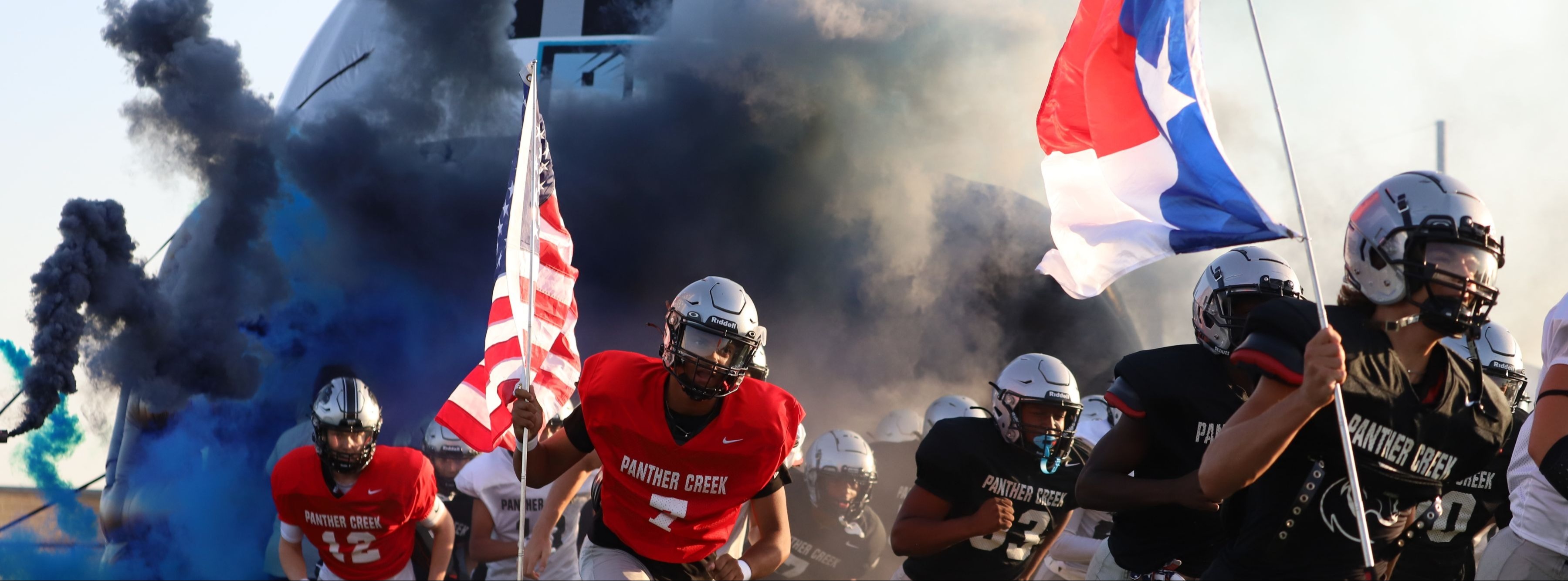 Football players running with flags