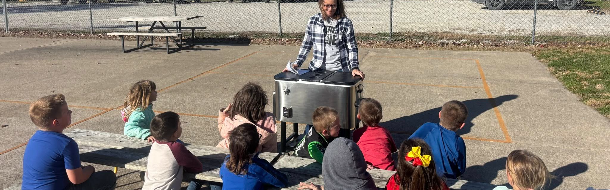Students and teacher participating in a class activity