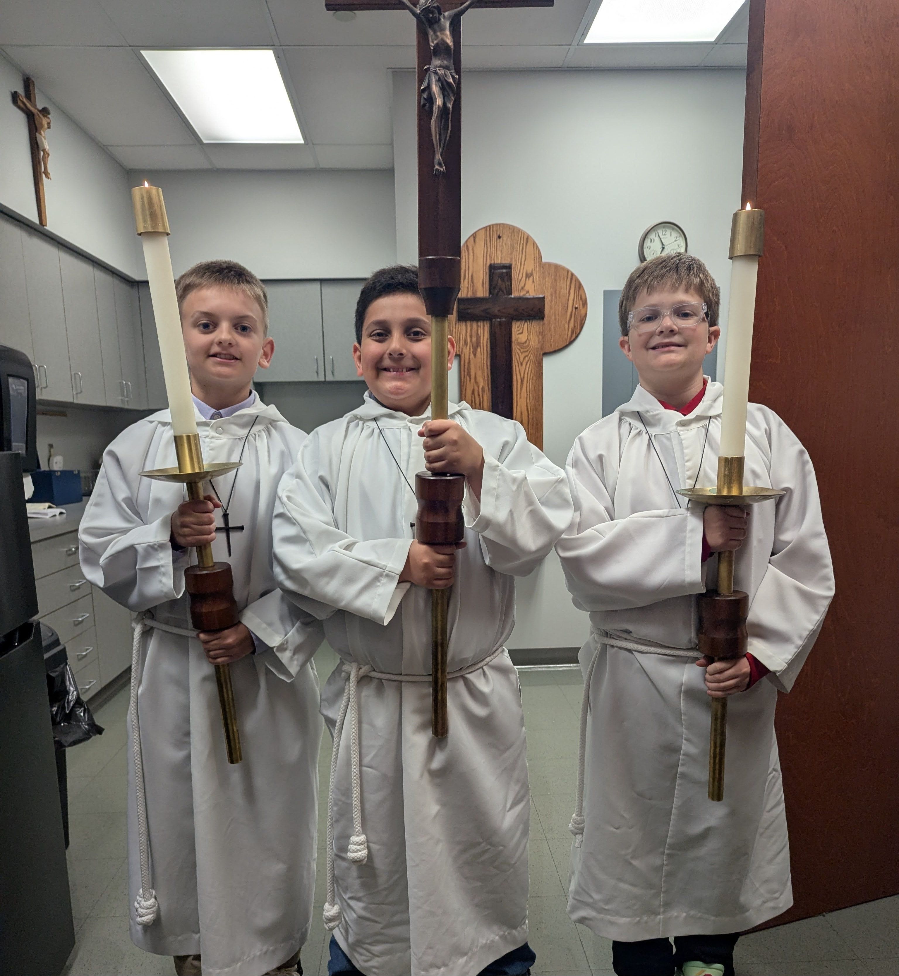 Students serving mass
