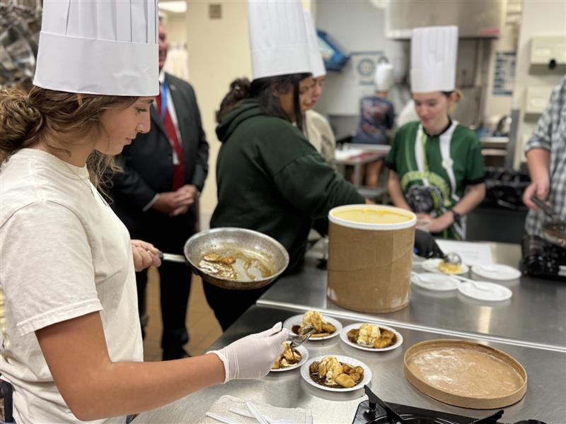 Students preparing bananas foster