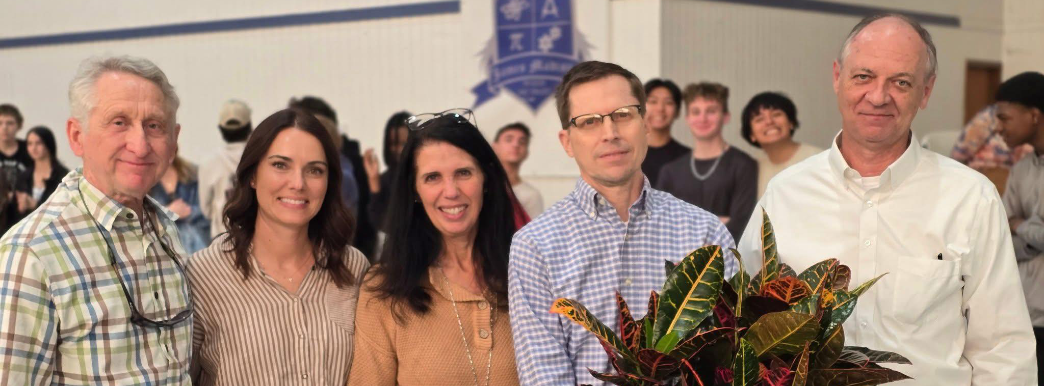 teachers and staff smiling