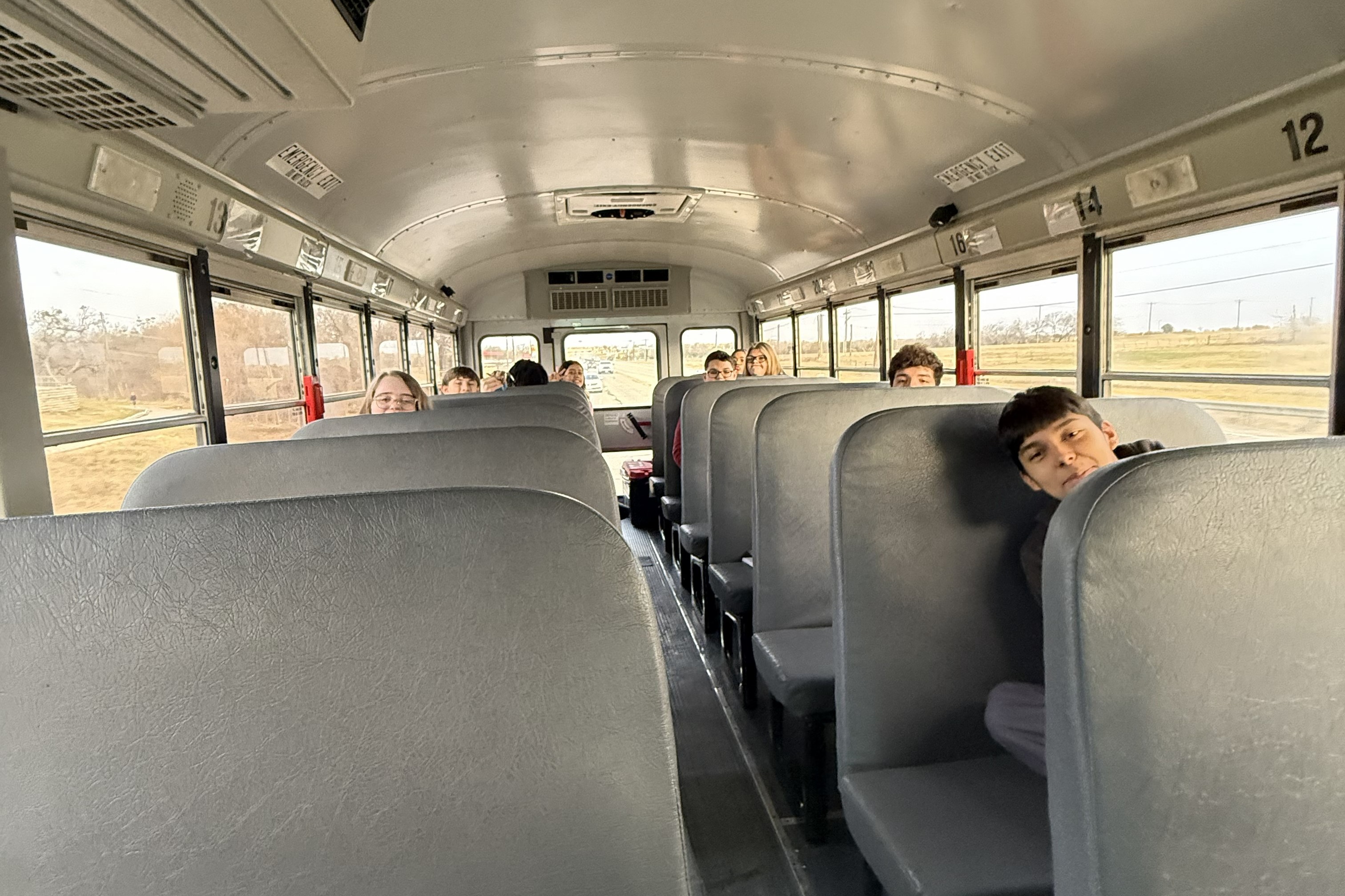 priority charter schools students on bus for field trip