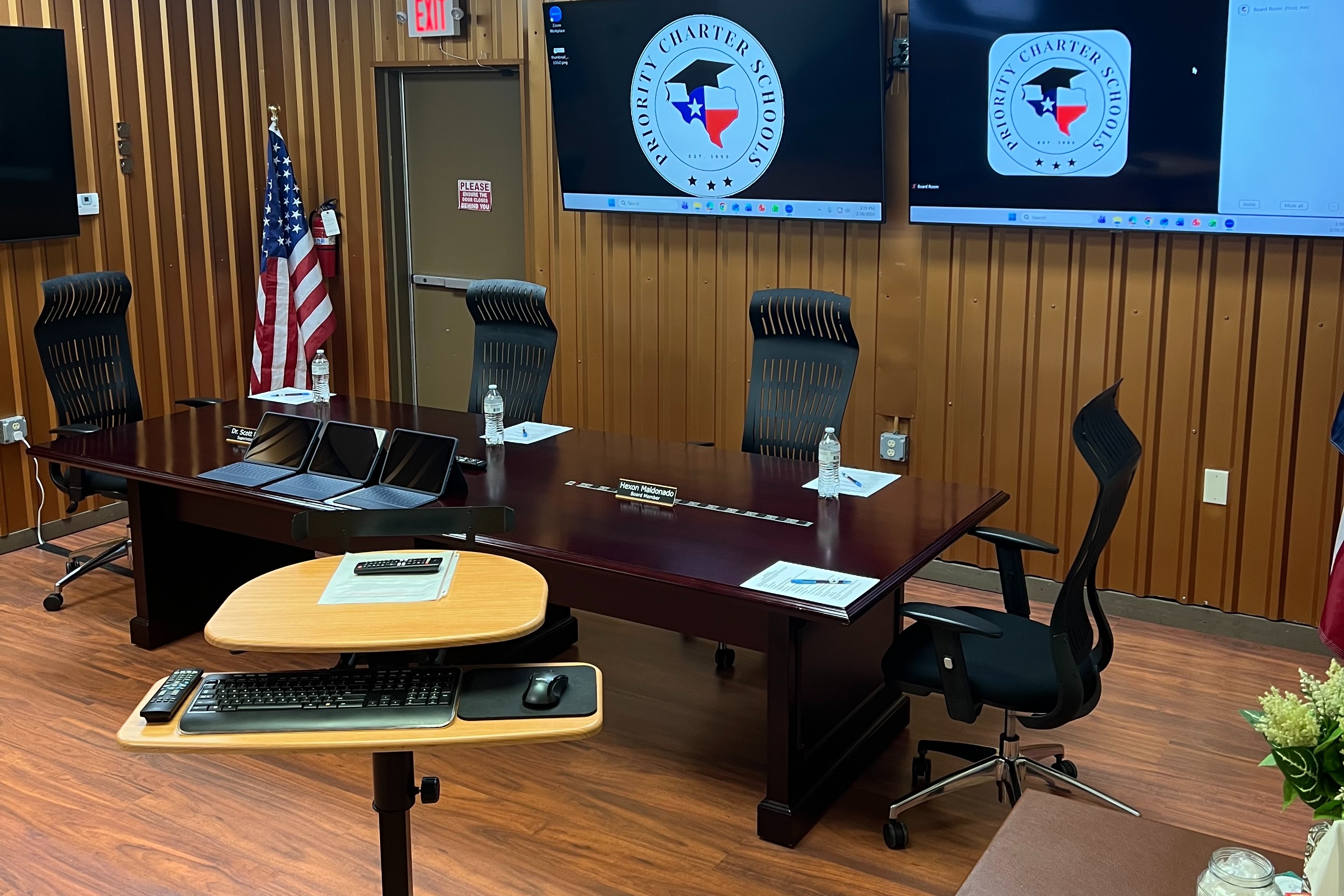 priority charter schools board of directors lettering on chalkboard