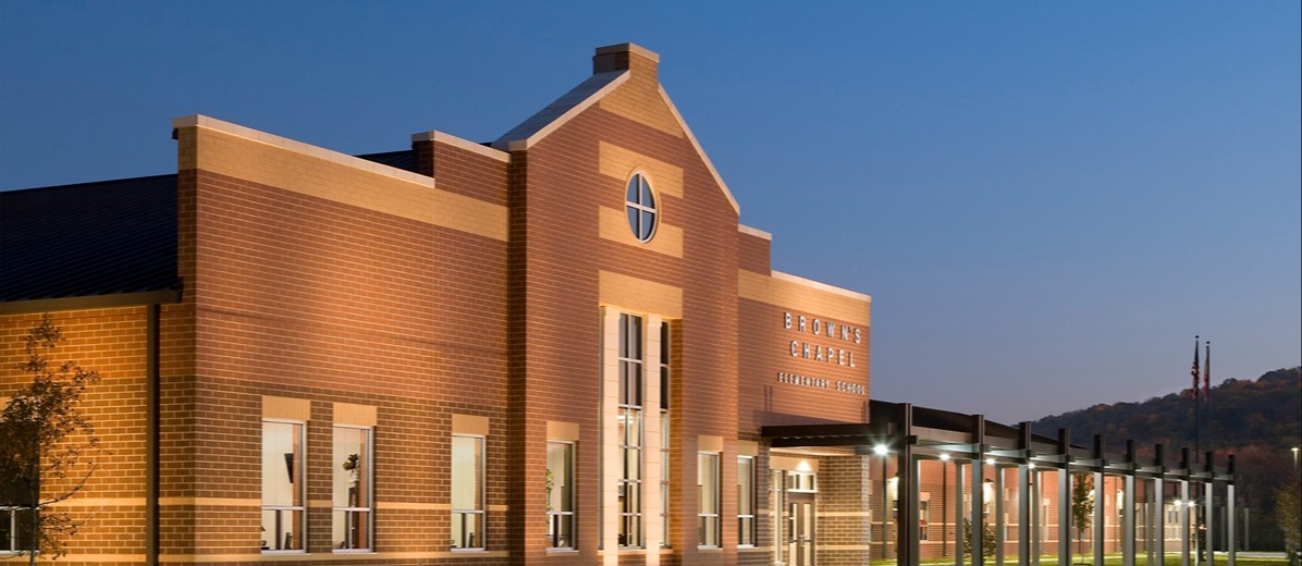 The front of Brown's Chapel Elementary as the sun is setting. 