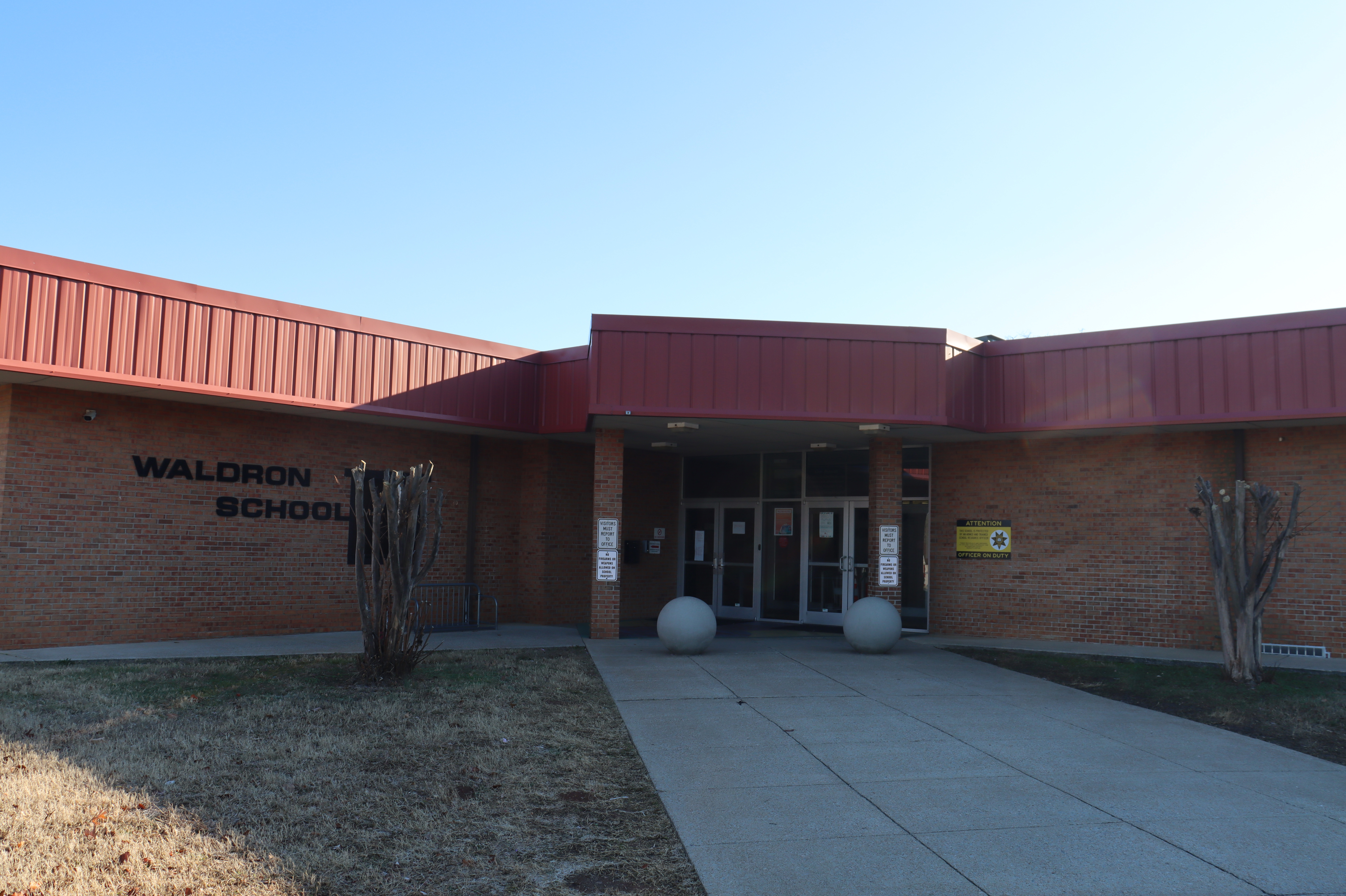 Brick Building with Waldron School in black letters