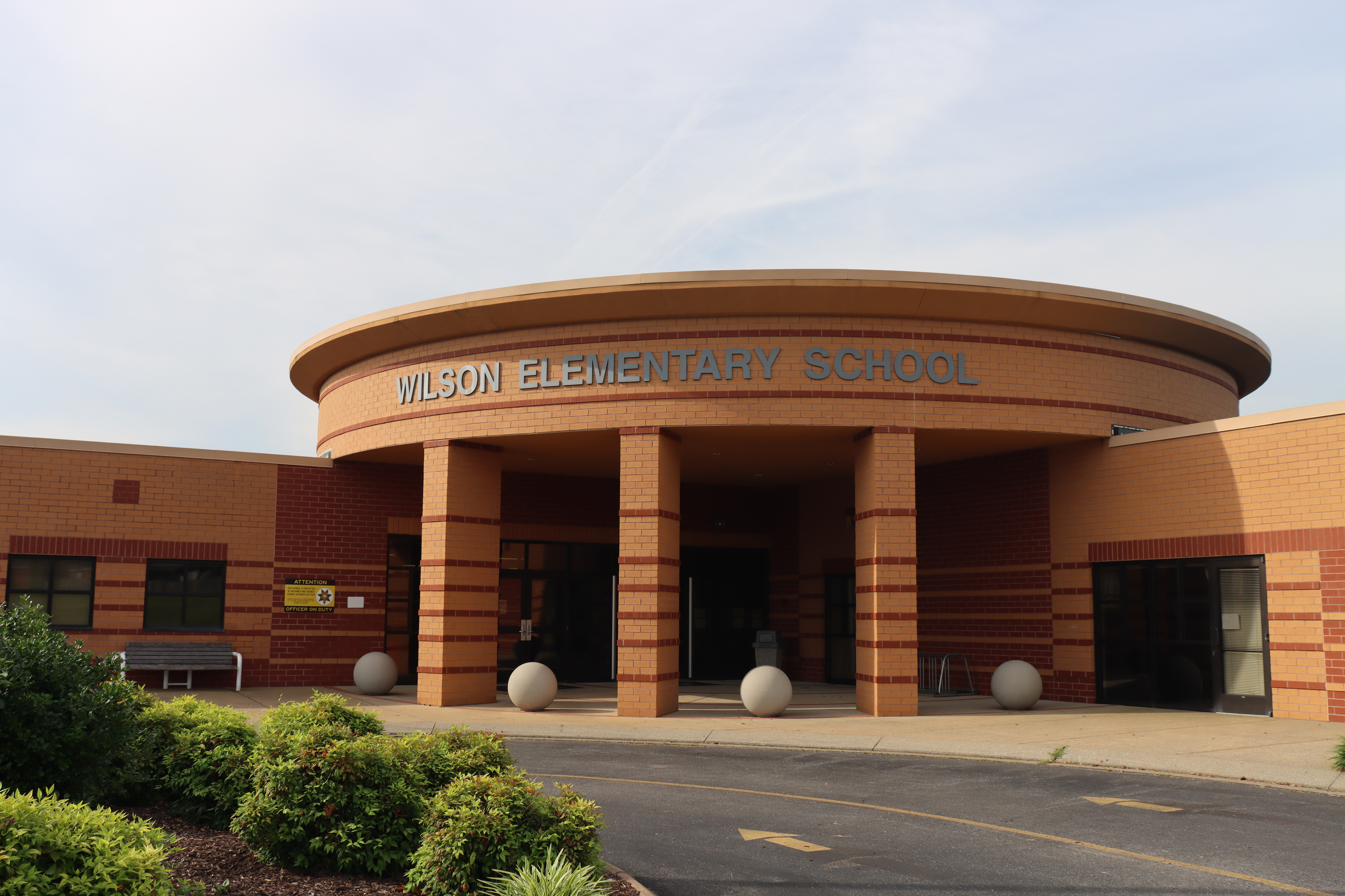 Brick building with Wilson Elementary School in gray letters