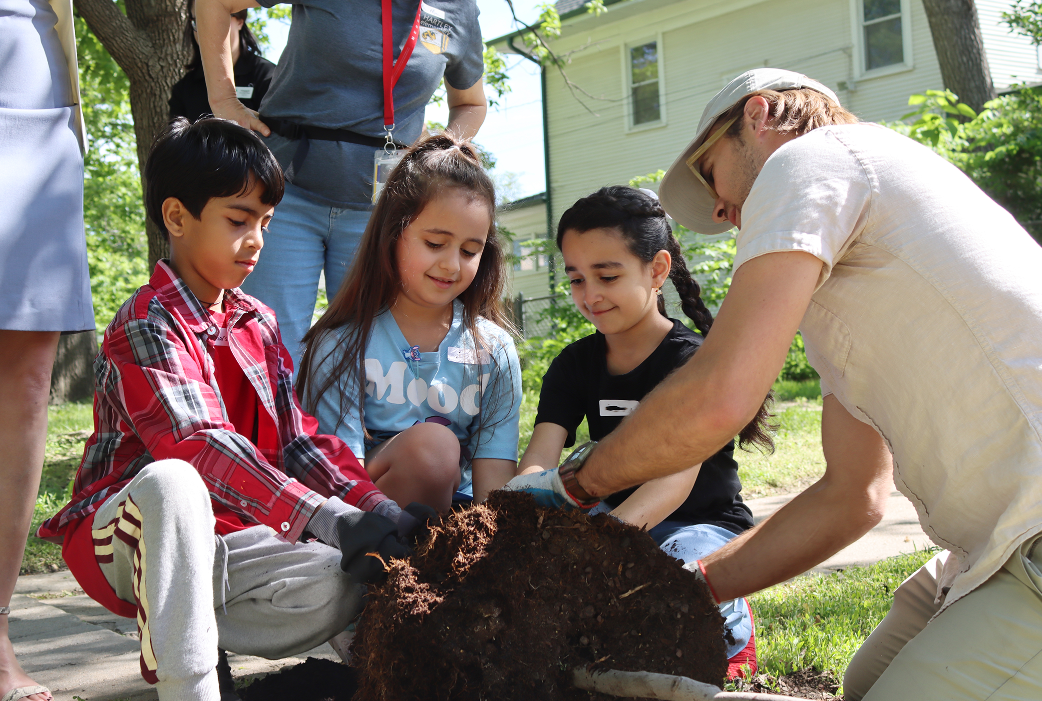 Hartley students planting a tree