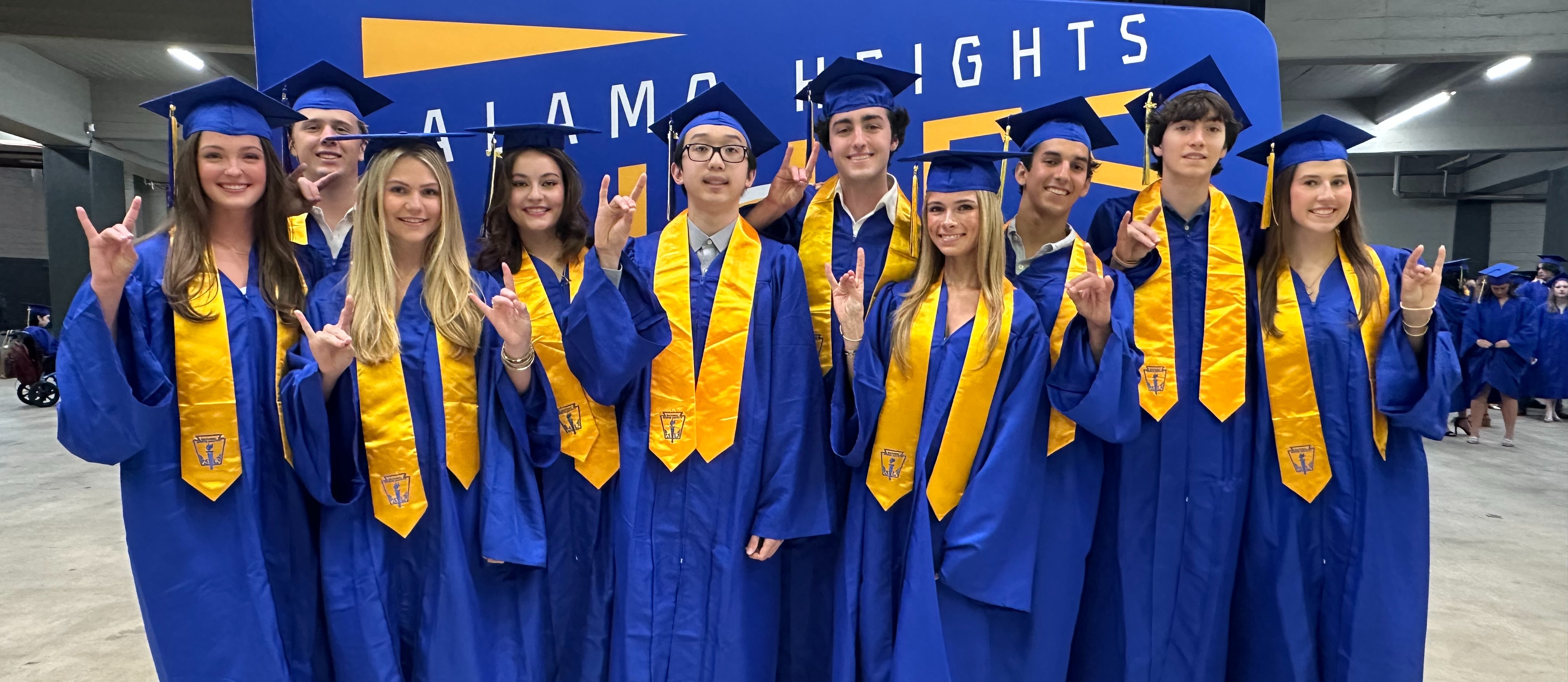 Top Ten pose before graduation ceremony