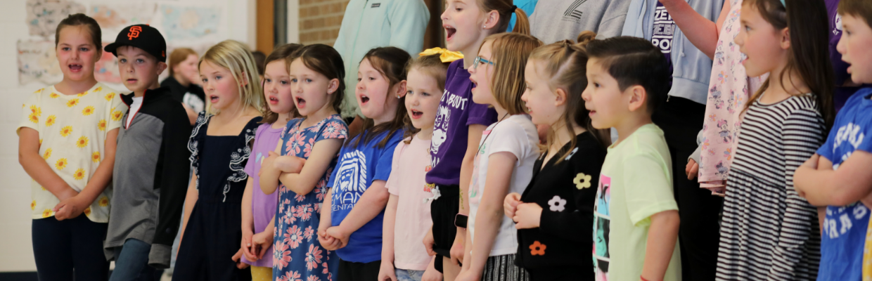 Zeman students singing in a choir
