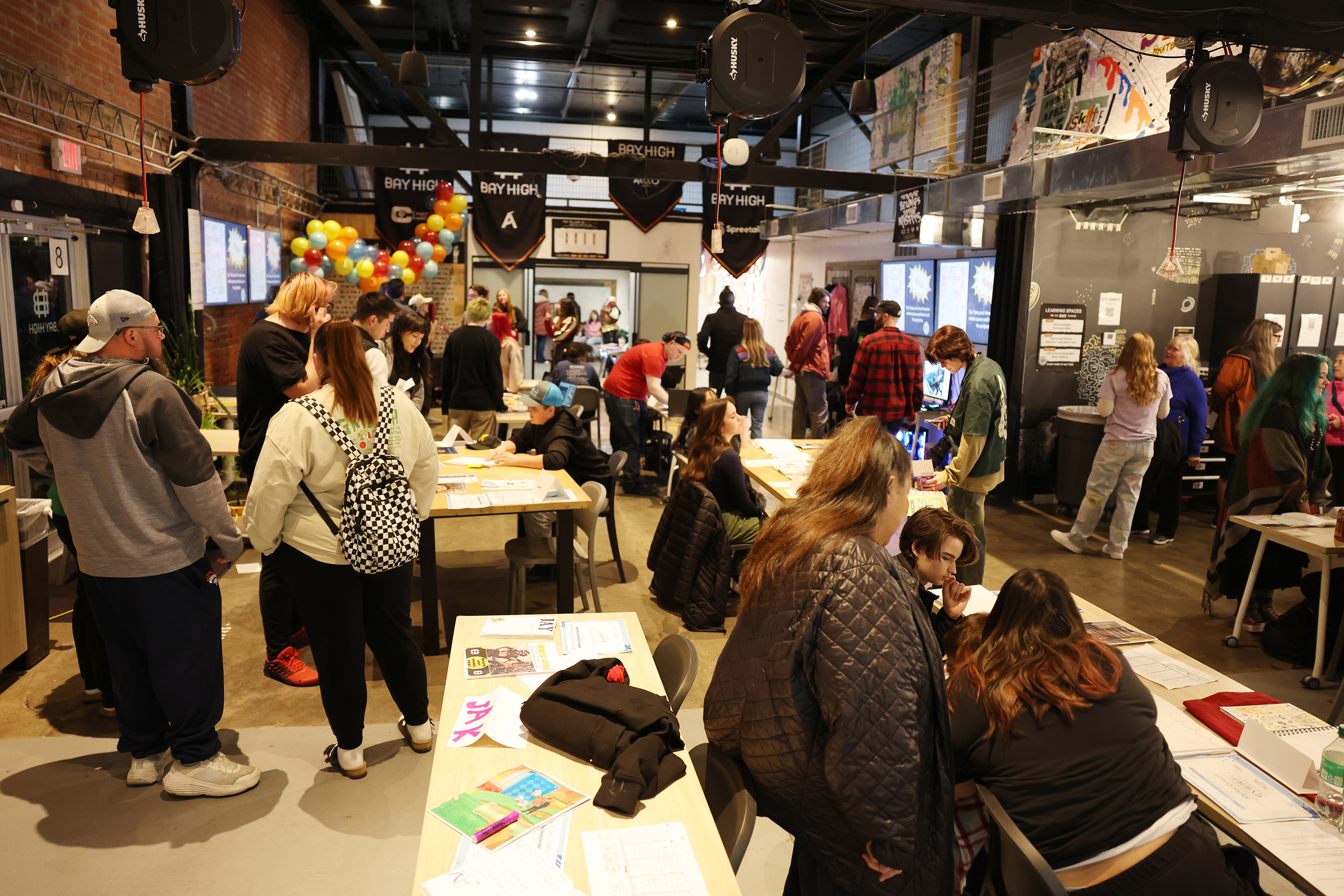 Bay High students showing off their work at a fair
