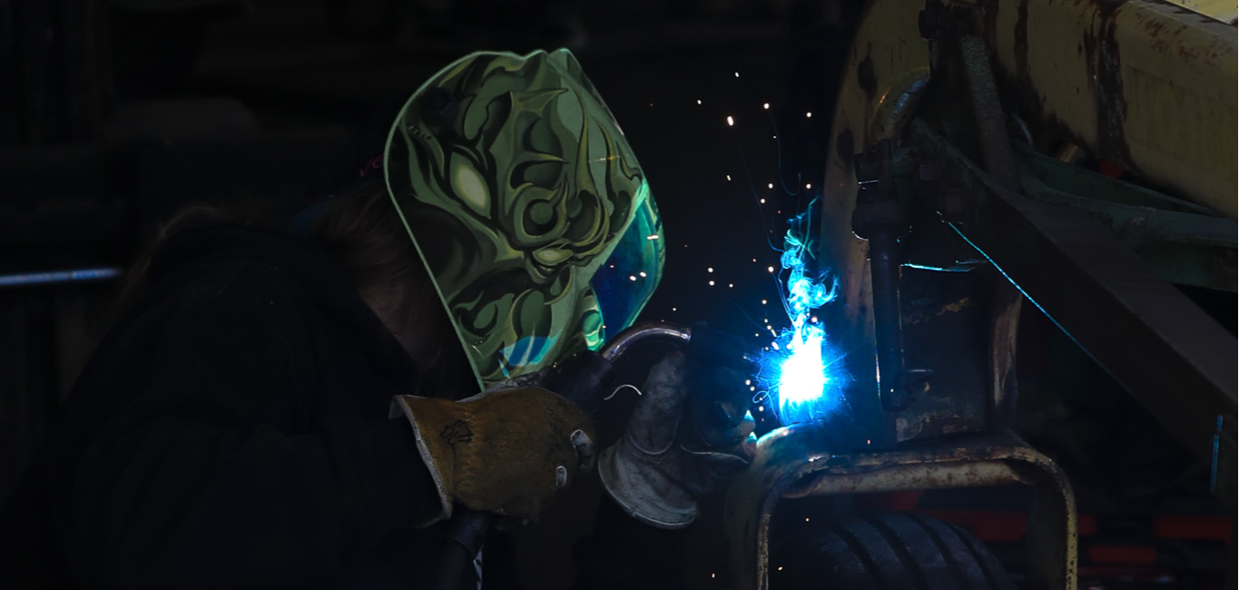 Welding student working on something