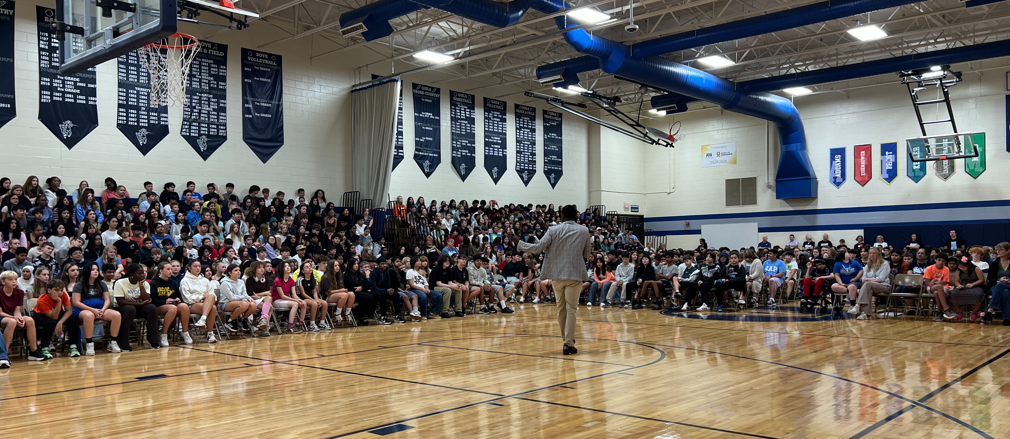 a speaker at a school assembly