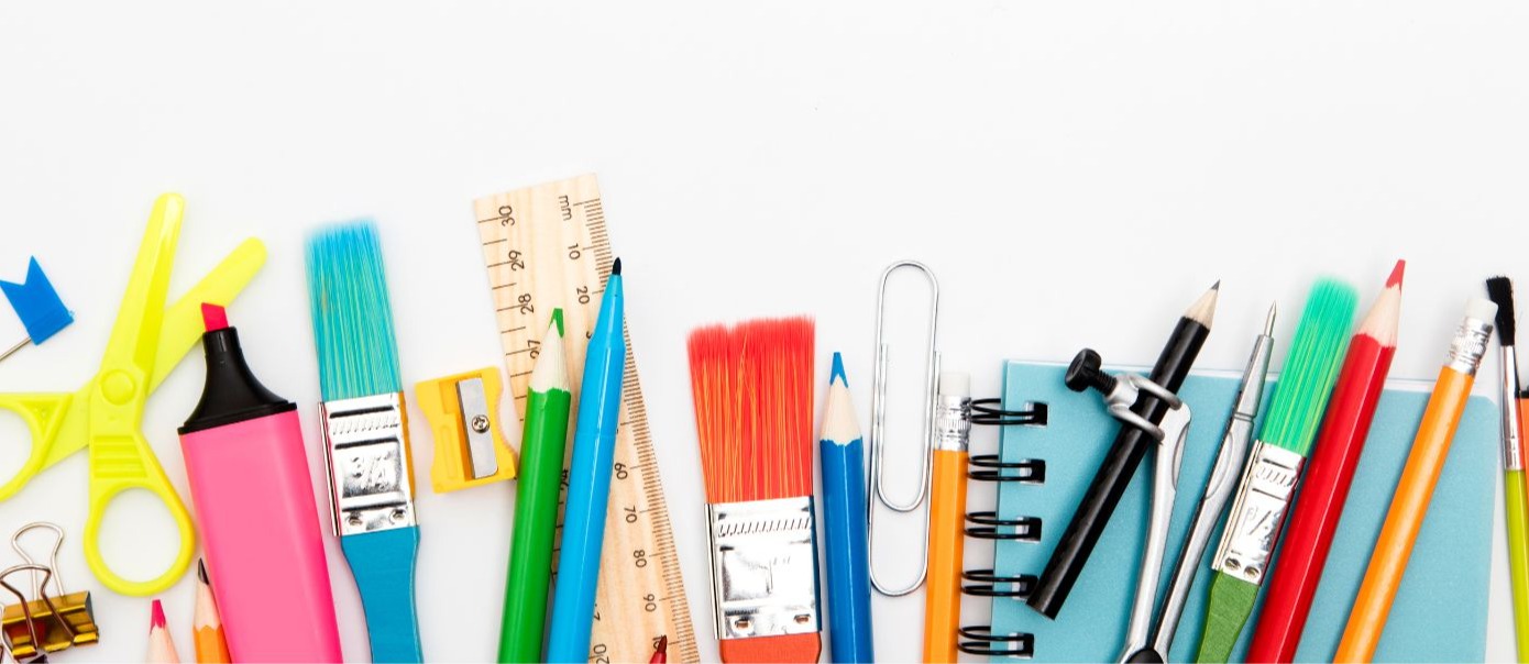 School supplies scattered against a white background