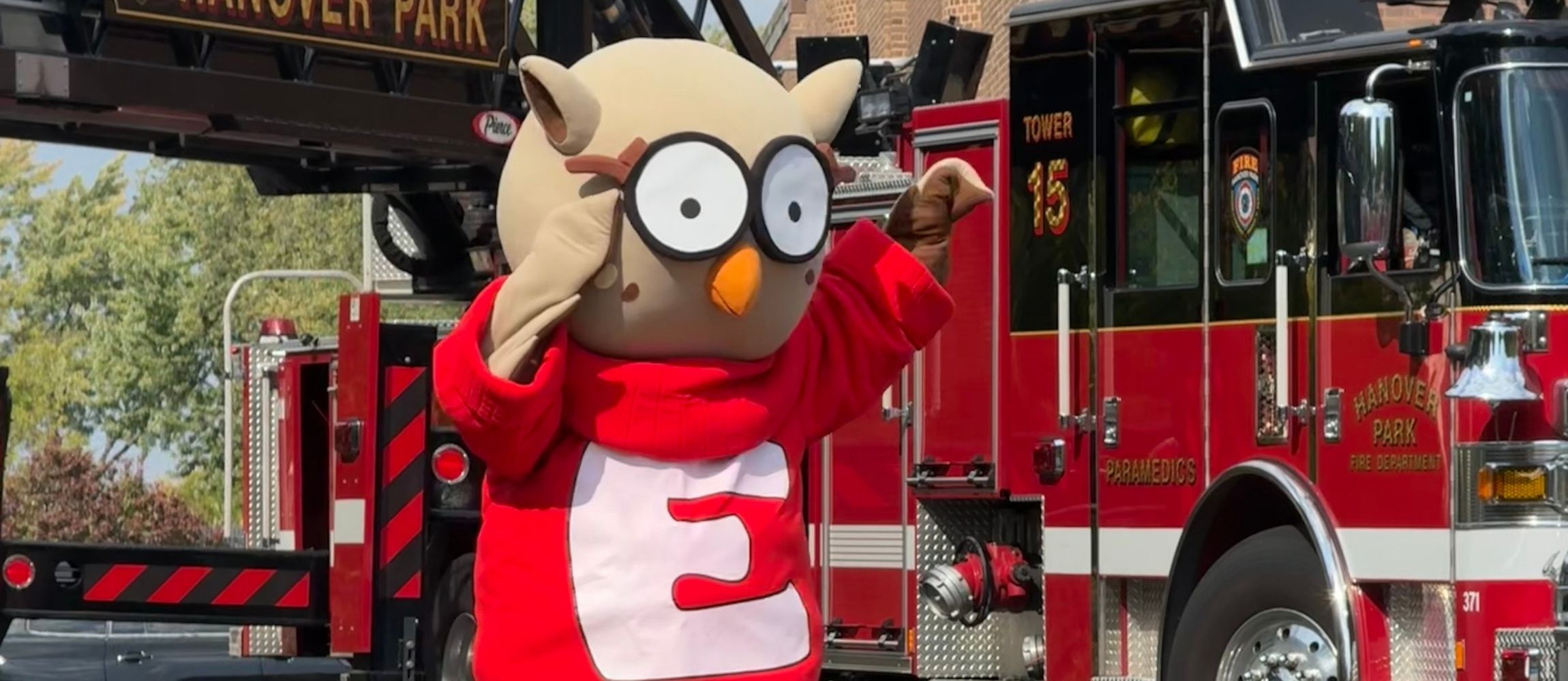 Owlbert in front of Hanover Park fire truck