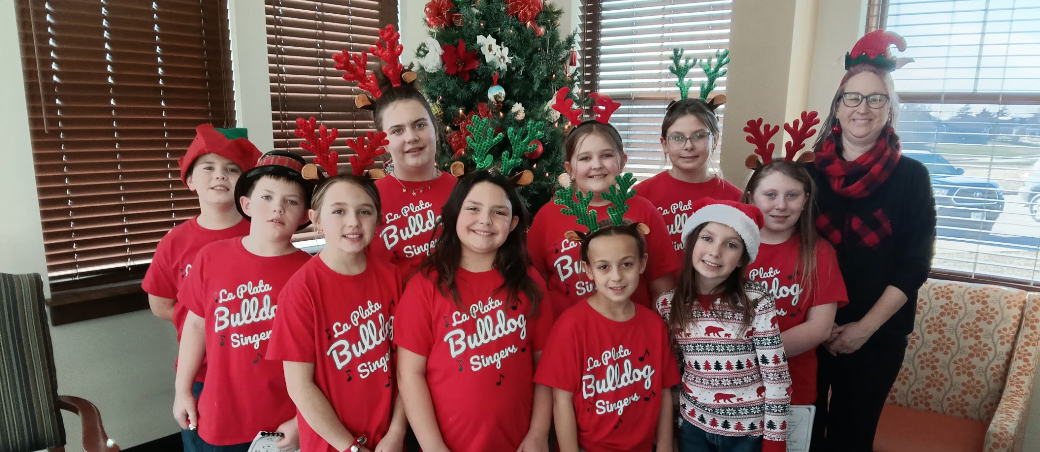 Elementary schools students with Christmas shirts