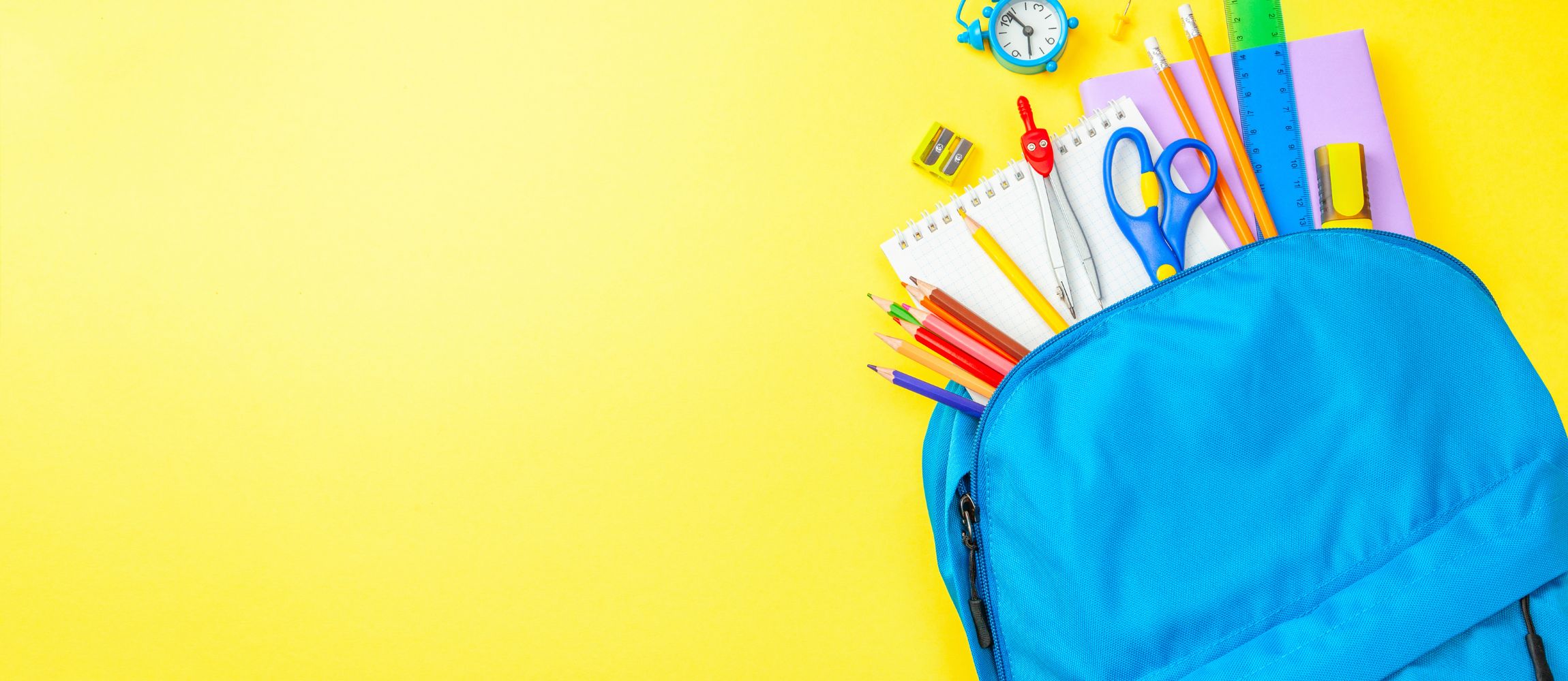 School supplies with a yellow background