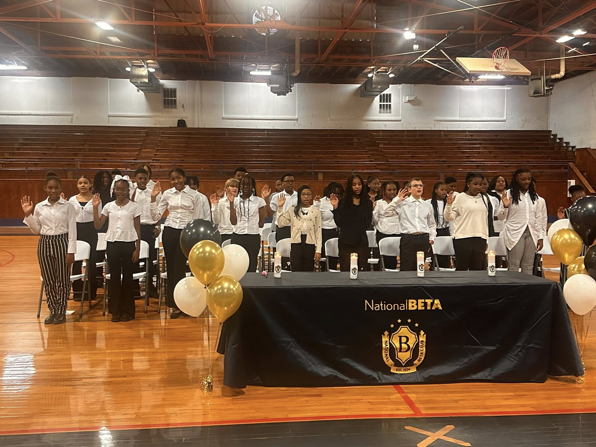 Students taking an oath
