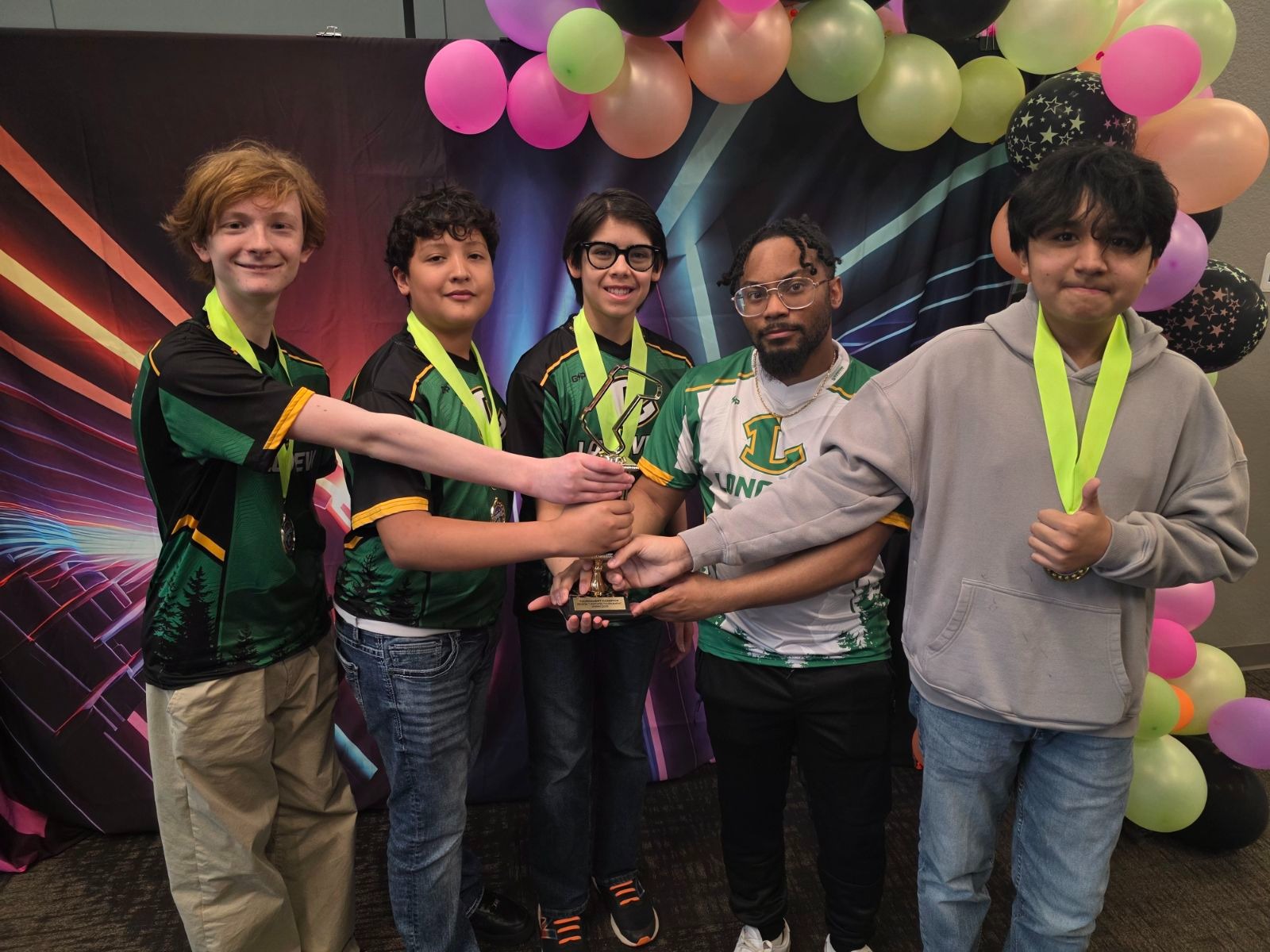 students with trophy