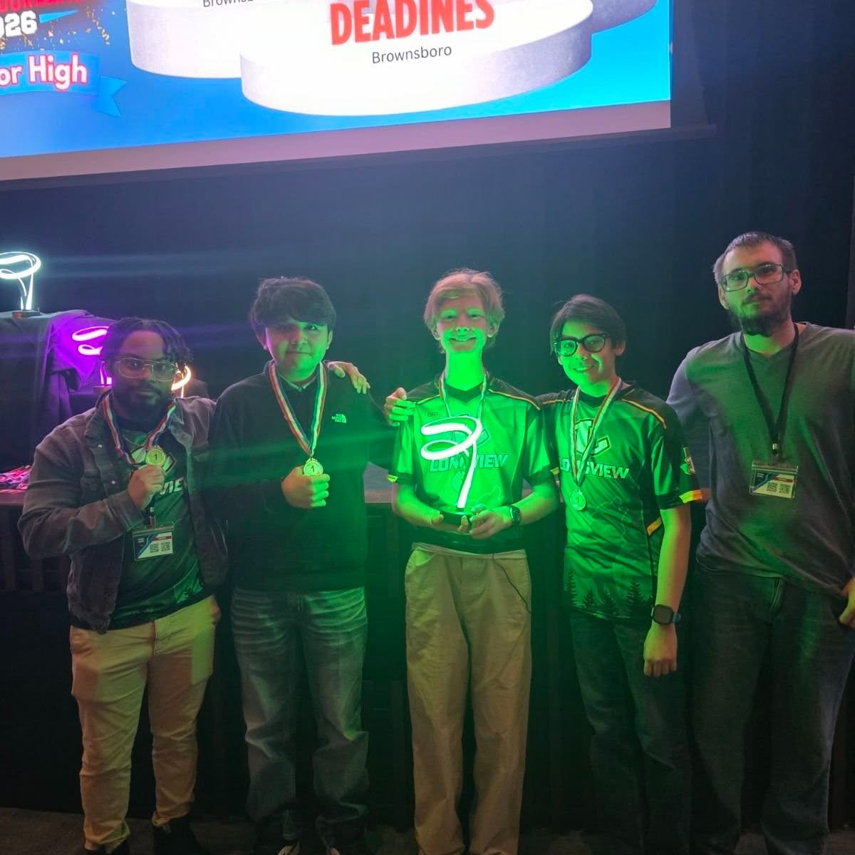 students with trophies