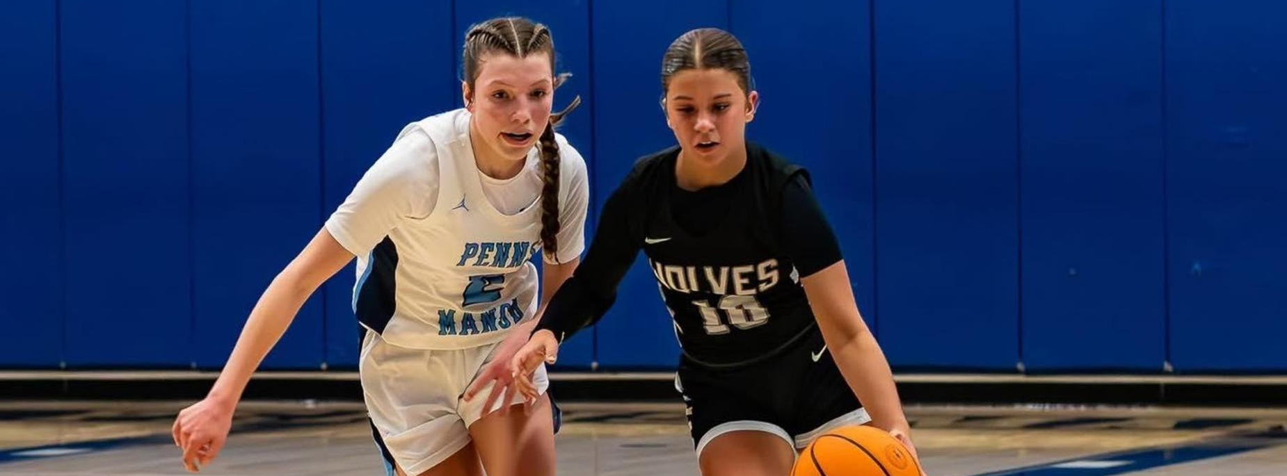 girls playing basketball