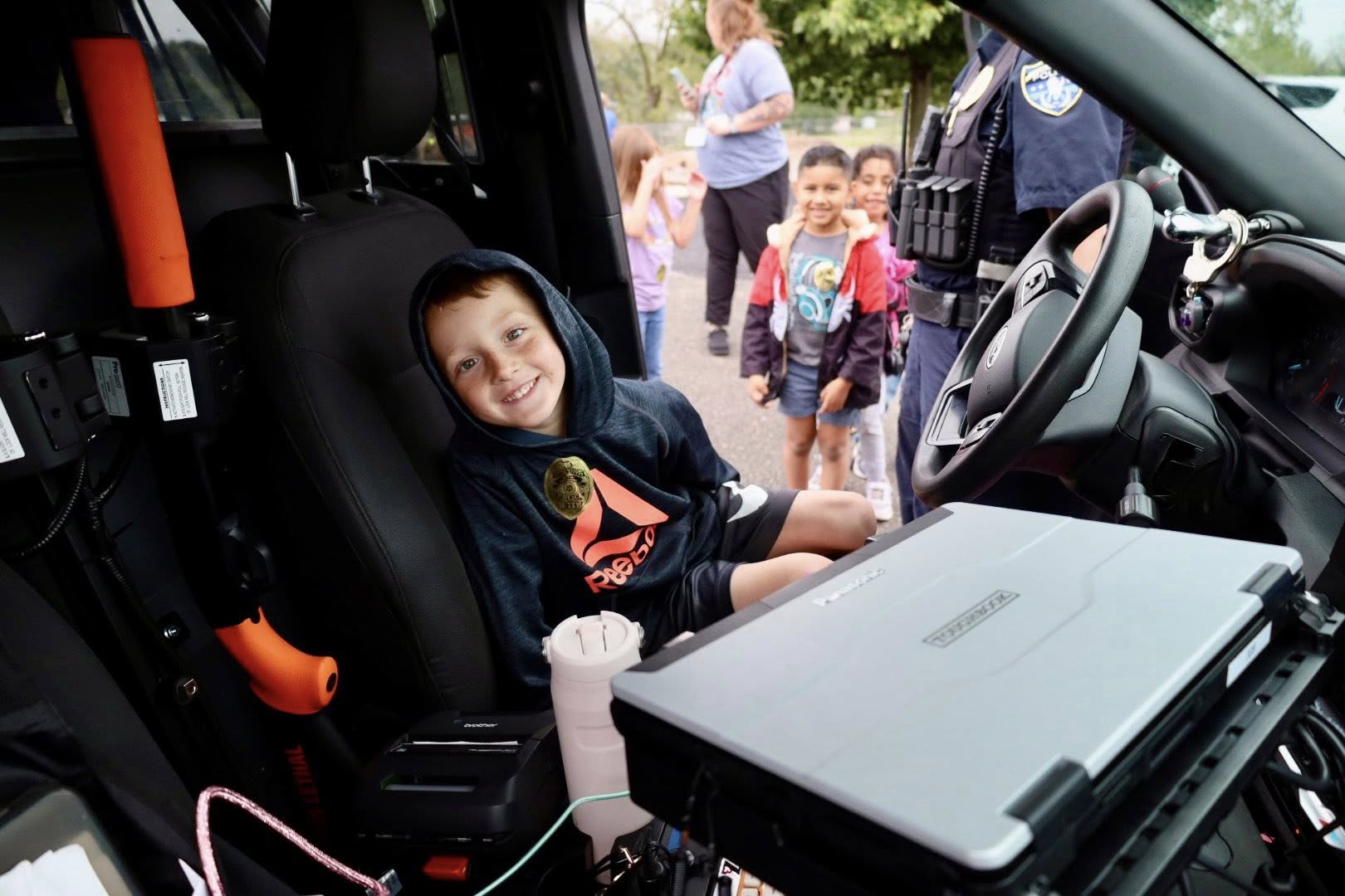Student in police car